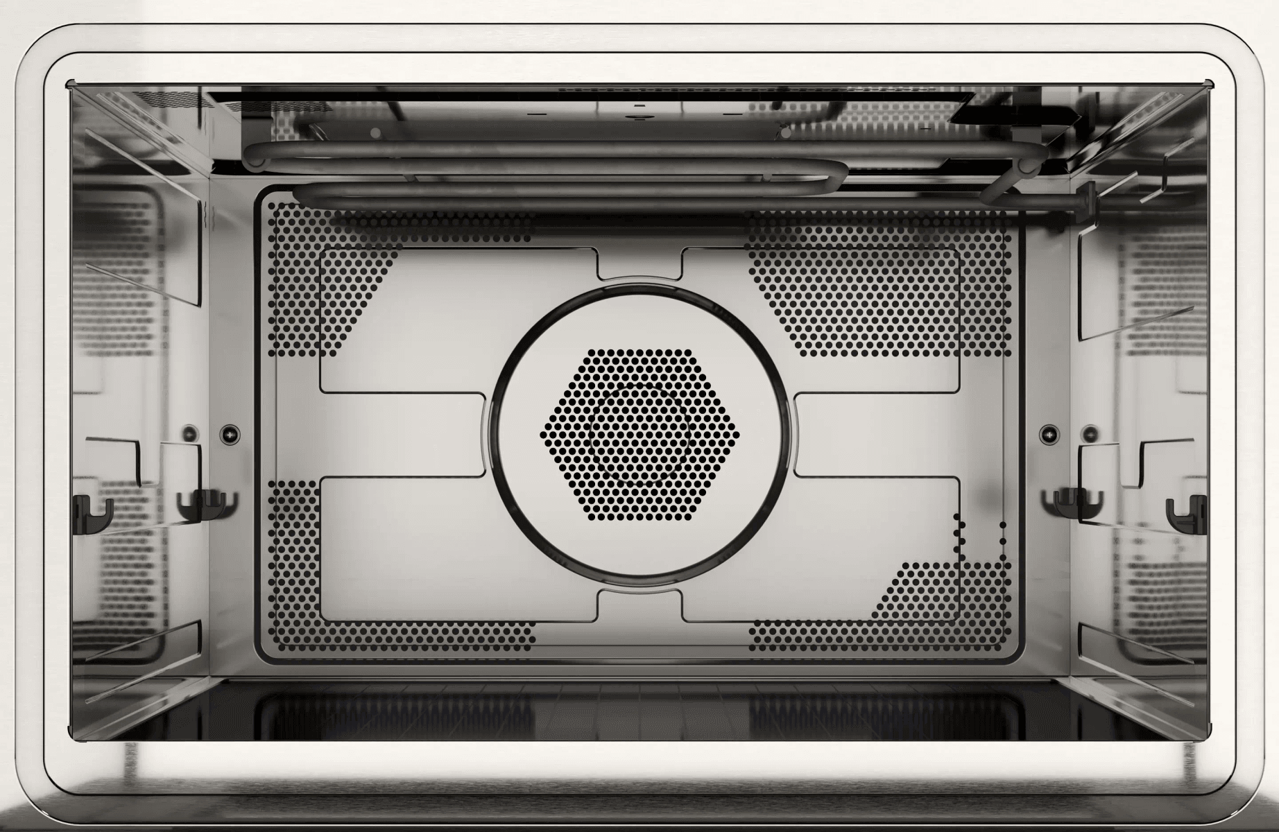 Interior de un horno moderno con resistencias y rejilla de ventilación.