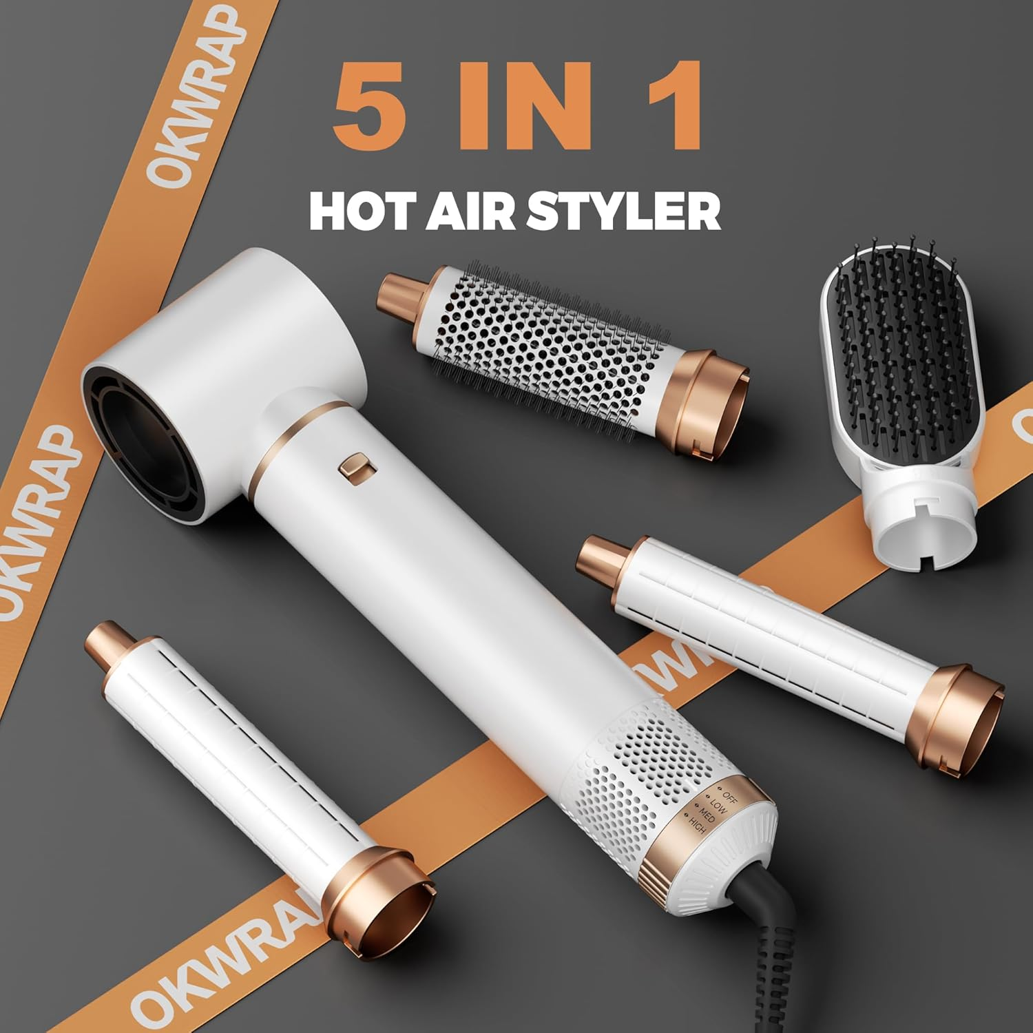 Ein weißer 5-in-1 Heißluftstyler mit Aufsätzen auf grauem Hintergrund.