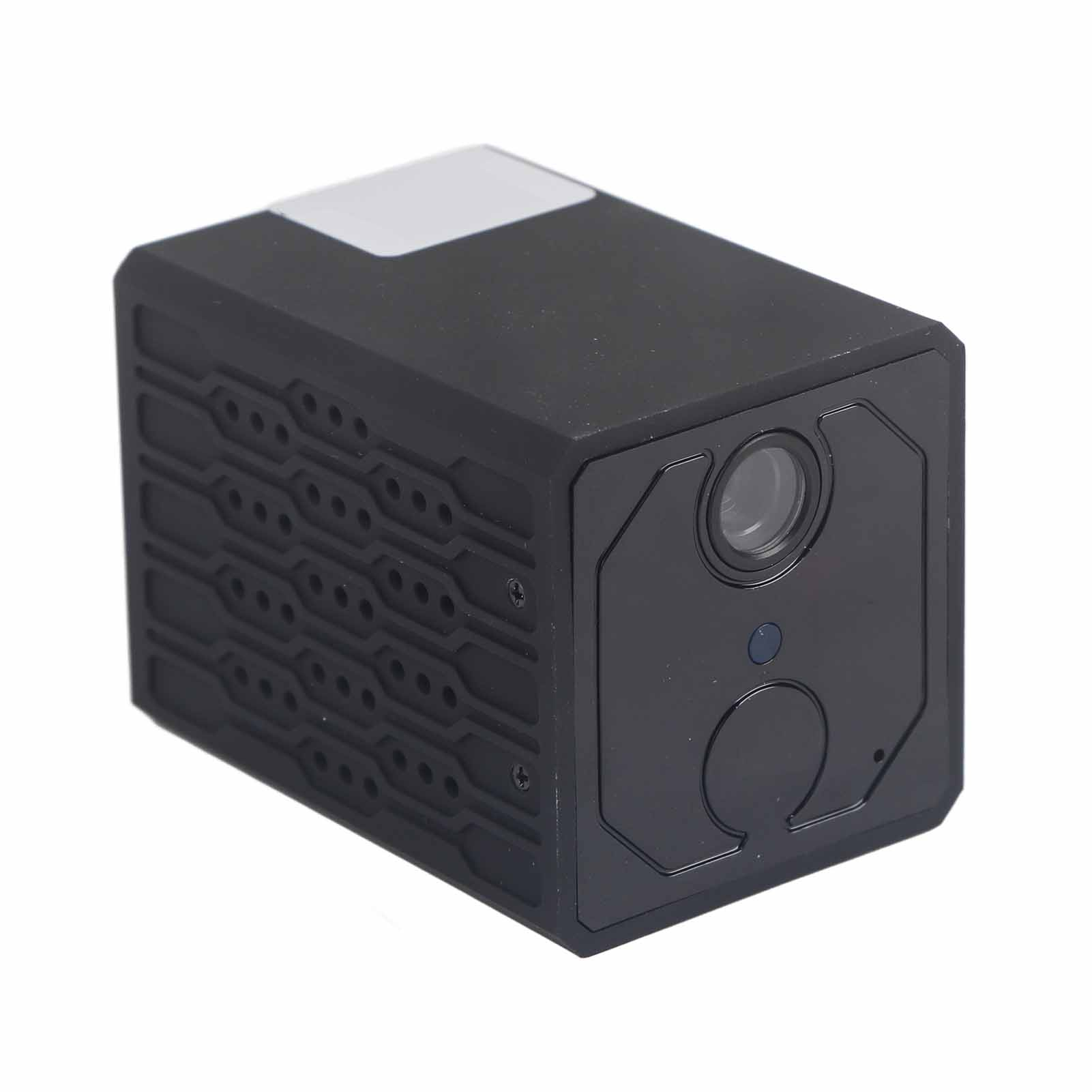 Kleine schwarze Kamera mit Linsenöffnung und blauem Licht auf wei ßem Hintergrund.