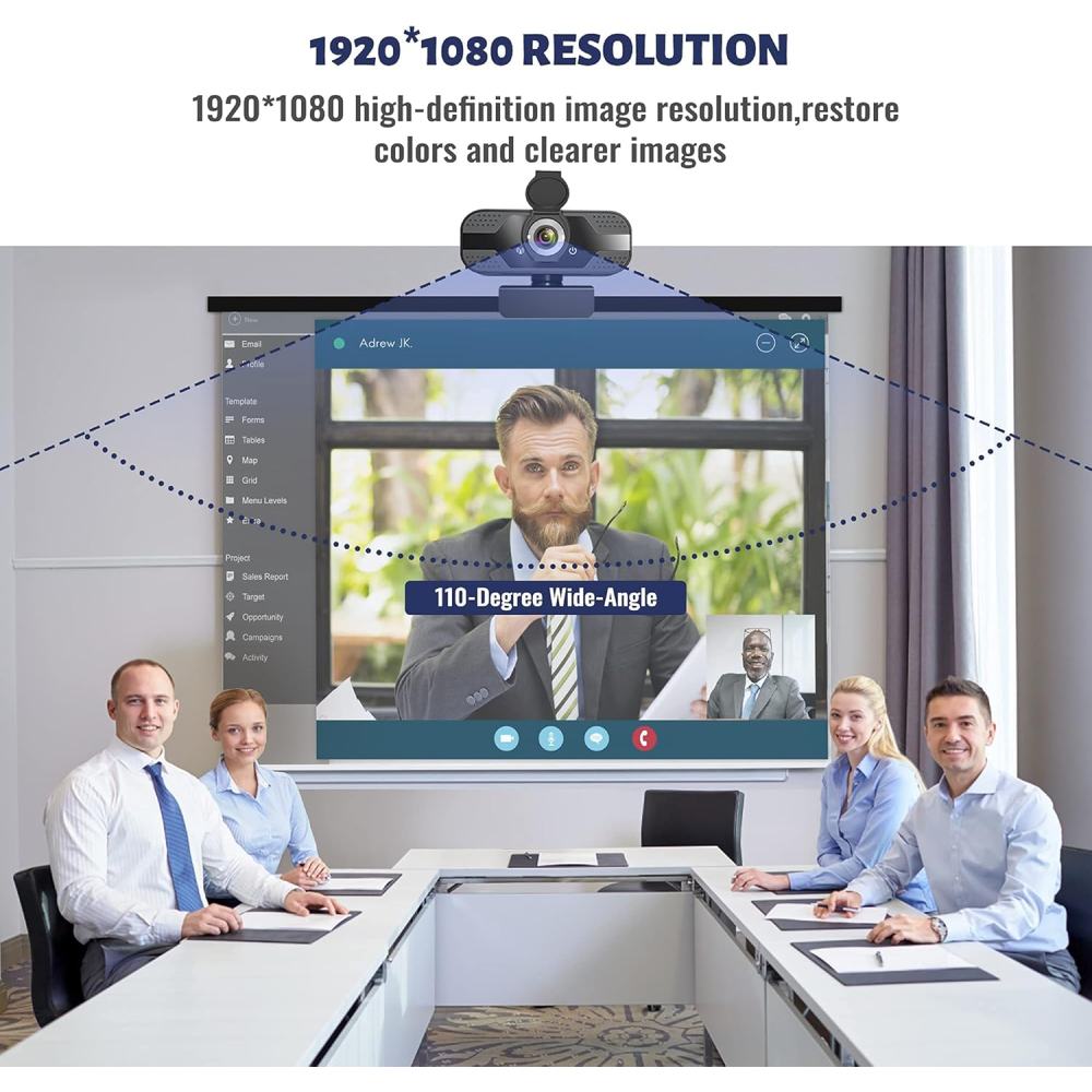 Webcam zeigt eine Videokonferenz. Vier Personen sitzen am Tisch, ein Bildschirm zeigt einen Mann.
