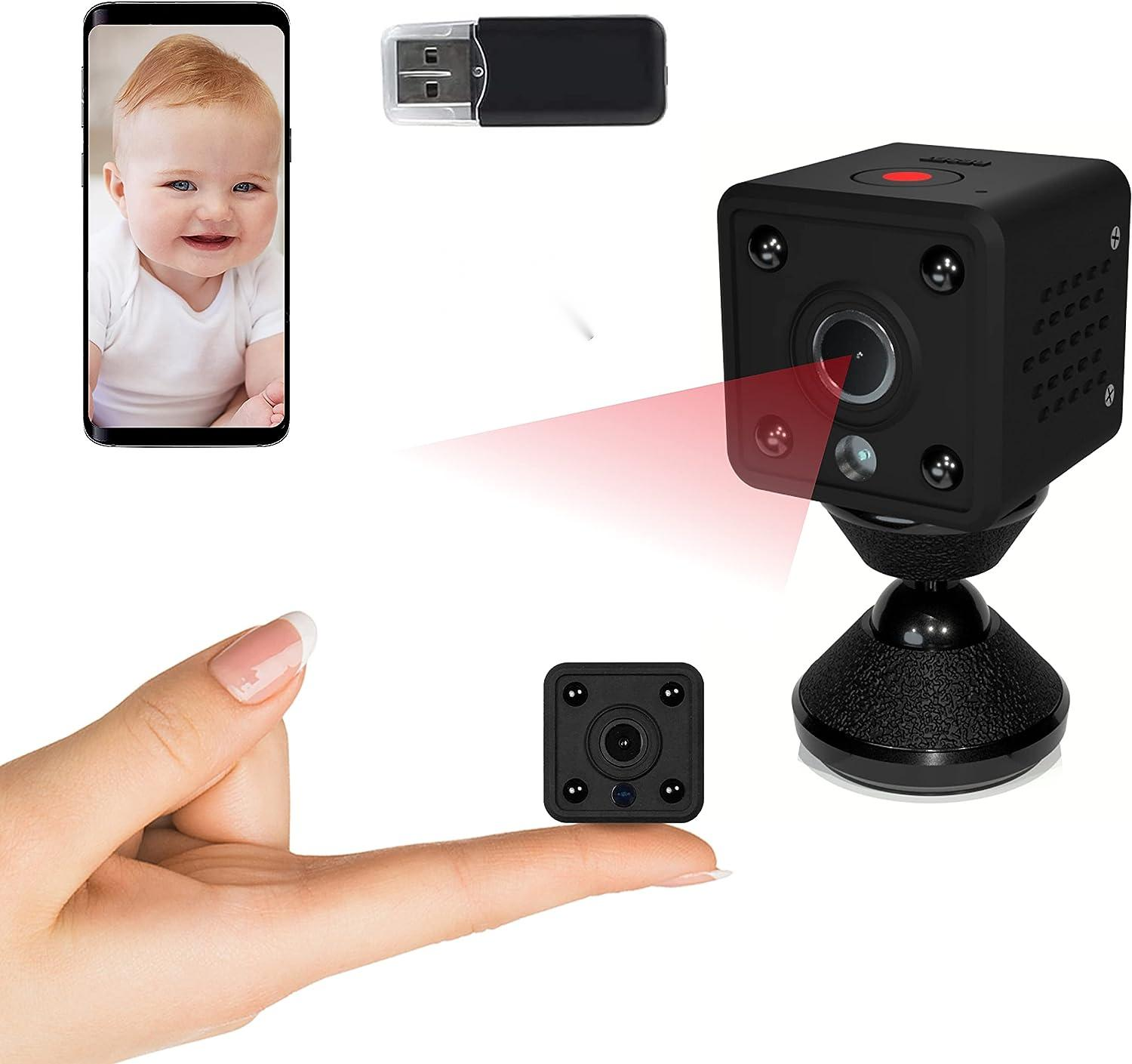 Ein Smartphone zeigt ein Baby. Ein USB-Stick, eine kleine und eine große Kamera sind zu sehen.