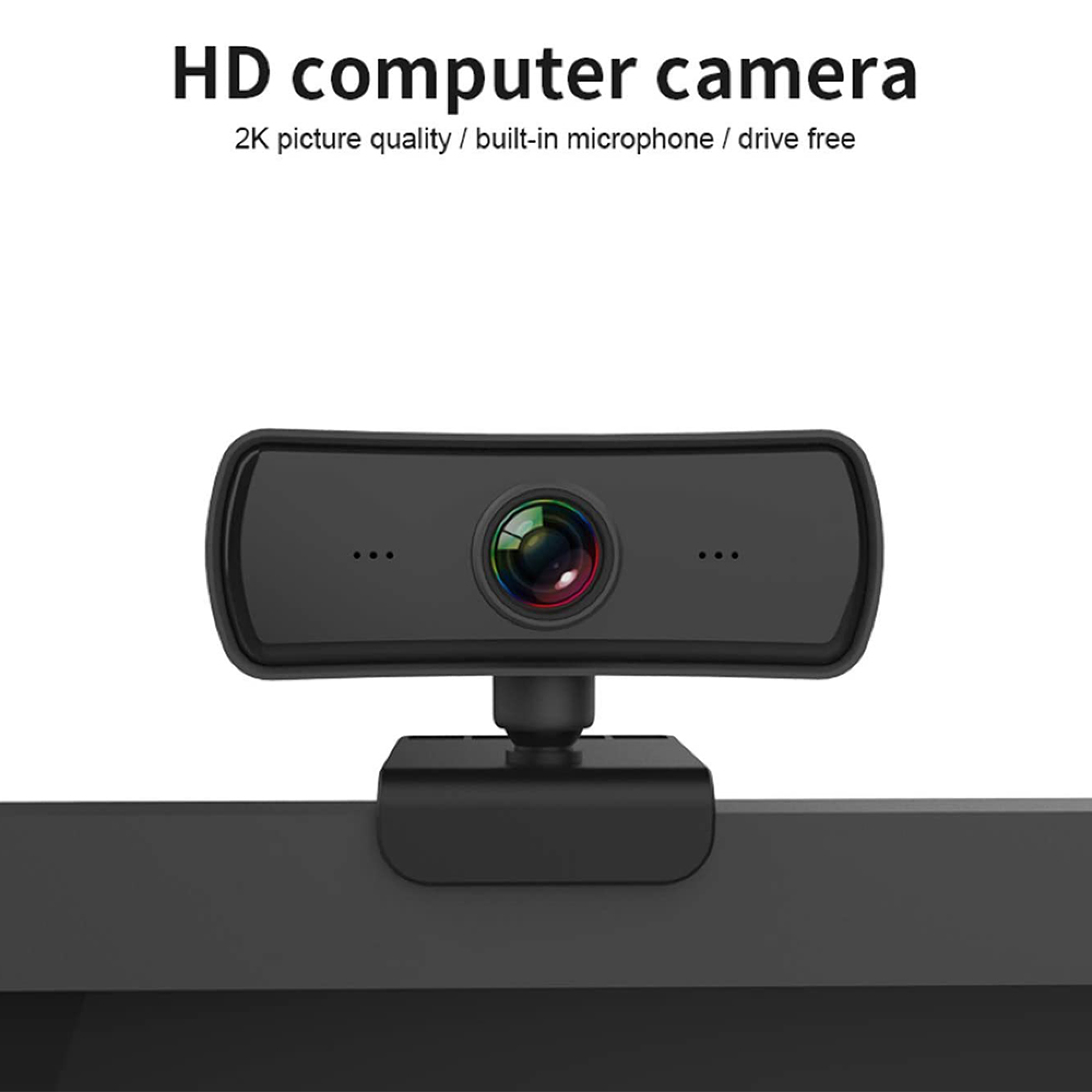 Eine schwarze HD-Computerkamera mit Linse und drei Punkten auf jeder Seite.