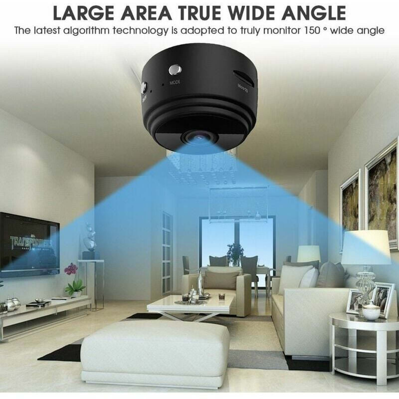 Eine kleine schwarze Kamera ist an der Decke montiert und projiziert blaue Lichtstrahlen.