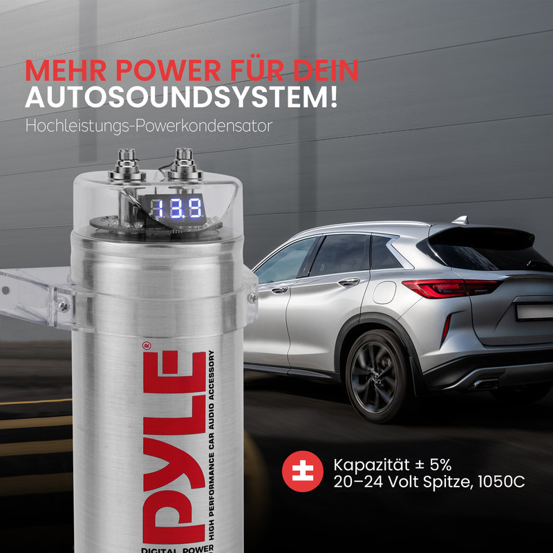 Silberner Kondensator mit digitaler Anzeige und Auto im Hintergrund.