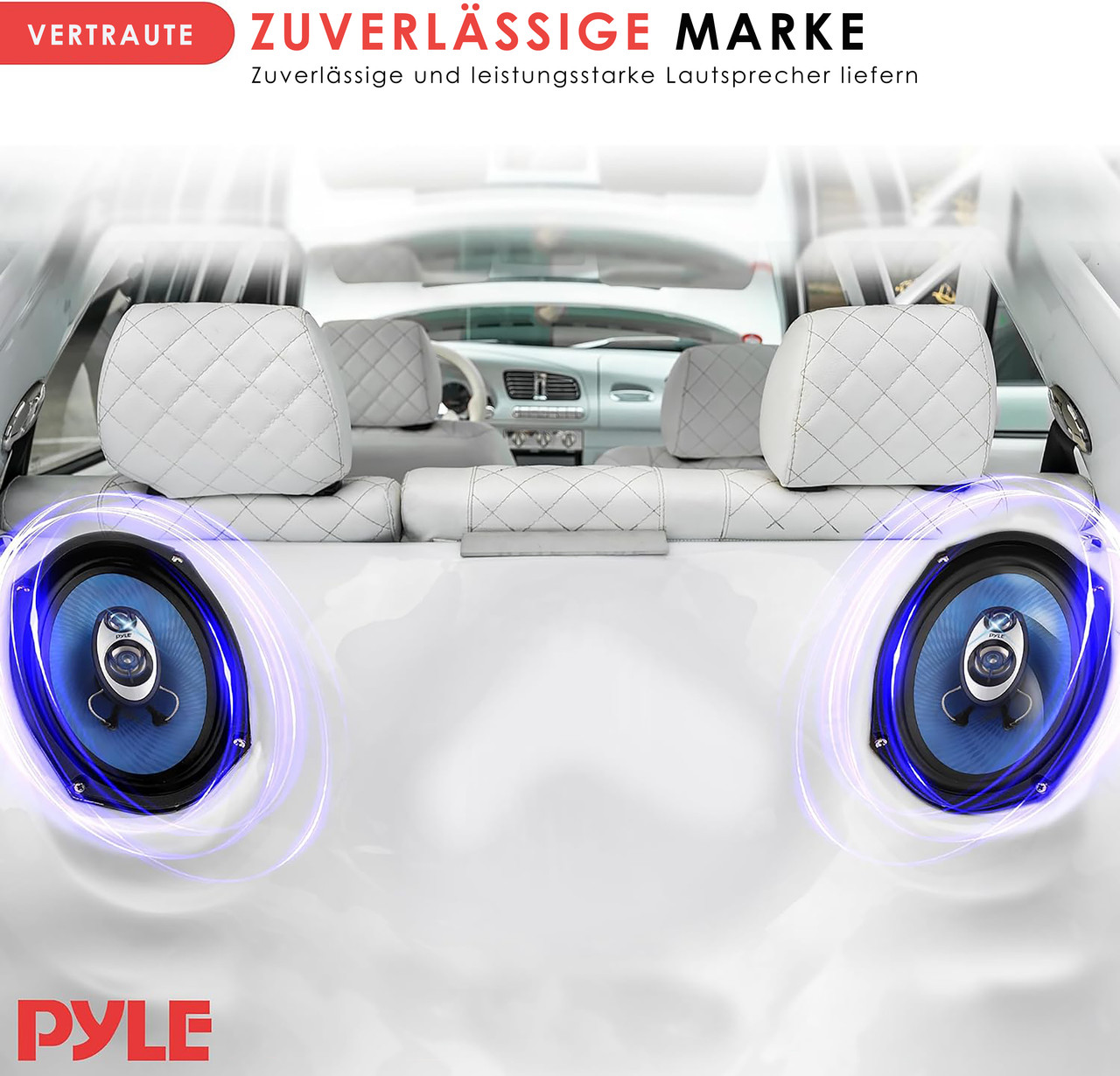 Zwei Pyle-Lautsprecher in einem weißen Auto mit weißen Ledersitzen.