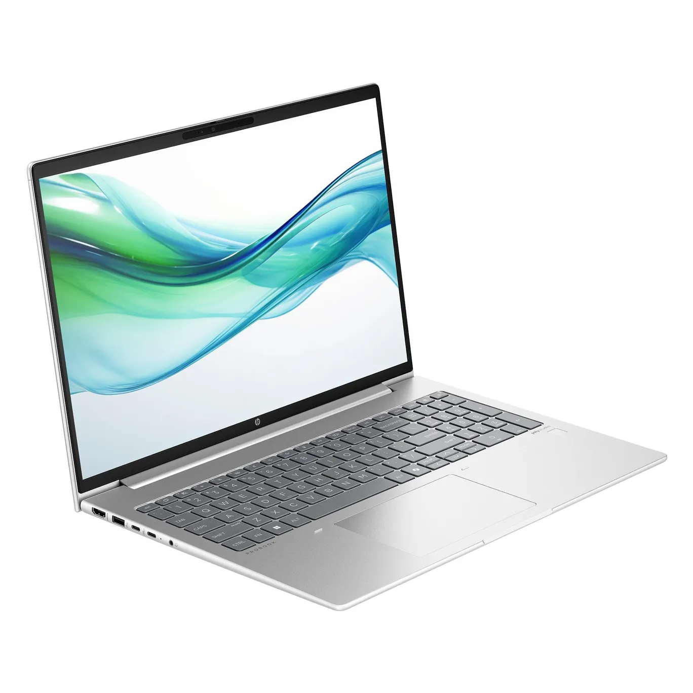 Ein silberner Laptop mit einem blauen und grünen Wellenhintergrund auf dem Bildschirm.