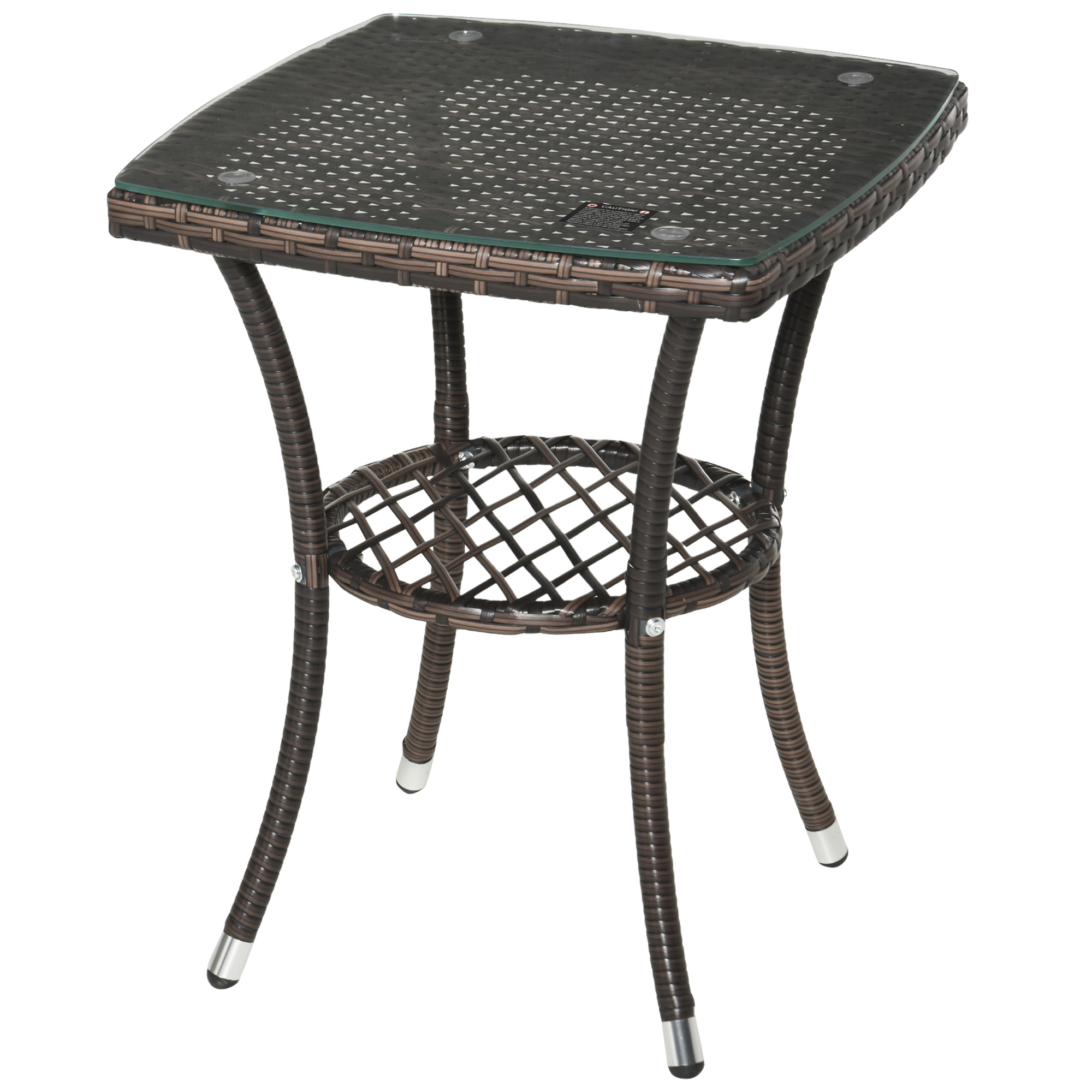 Tavolo in rattan marrone con piano in vetro e ripiano incrociato.