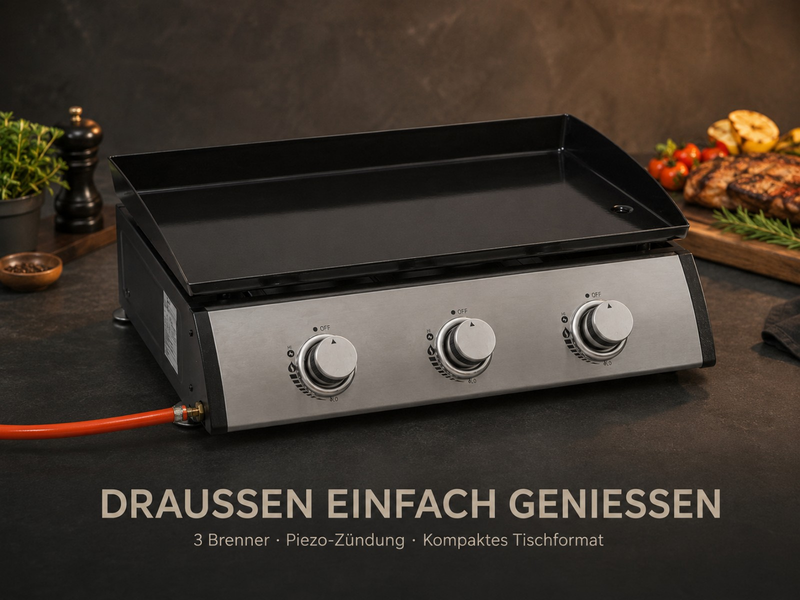 Ein dreiflammiger Tischgrill mit silberner Front und drei Drehreglern.