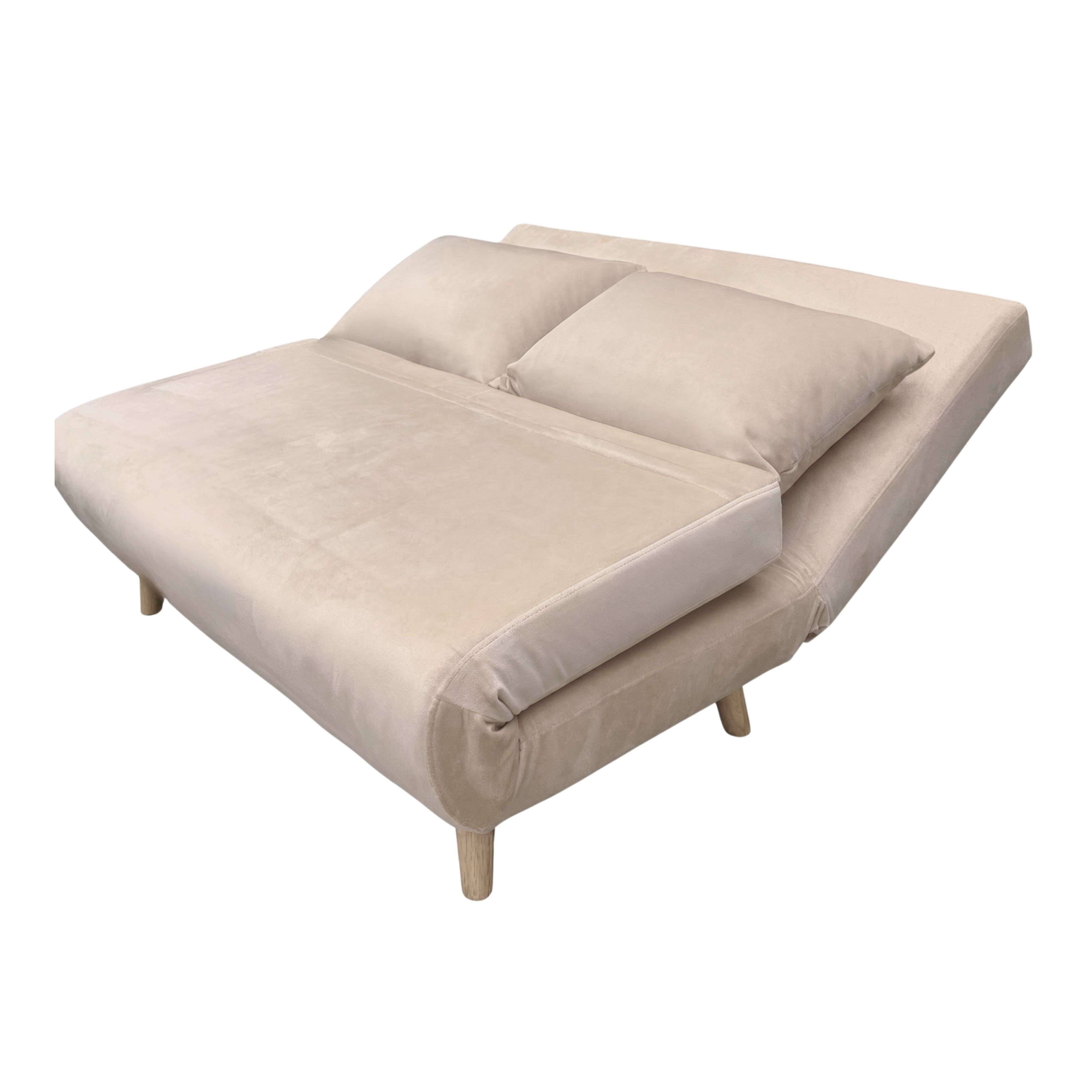 Un sofá cama beige con dos cojines y patas de madera.