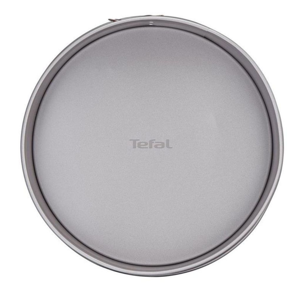 Ortasında Tefal logosu bulunan gri yuvarlak kek kalıbı tabanı.