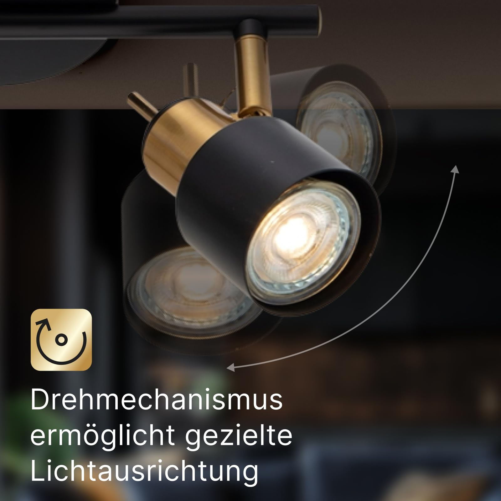 Schwarzer Lampenstrahler mit goldener Fassung, drehbar, mit einem Symbol für Drehmechanismus.