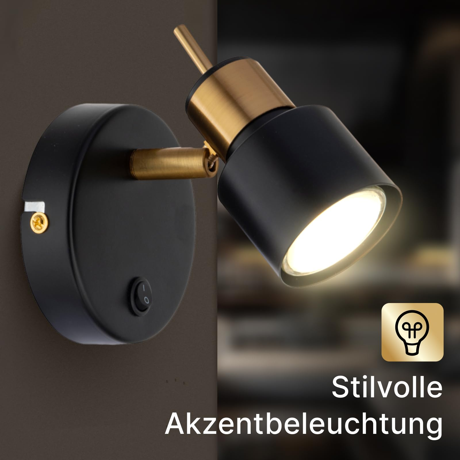 Eine schwarze Wandlampe mit Messingakzenten, einem Schalter und hellem Licht.