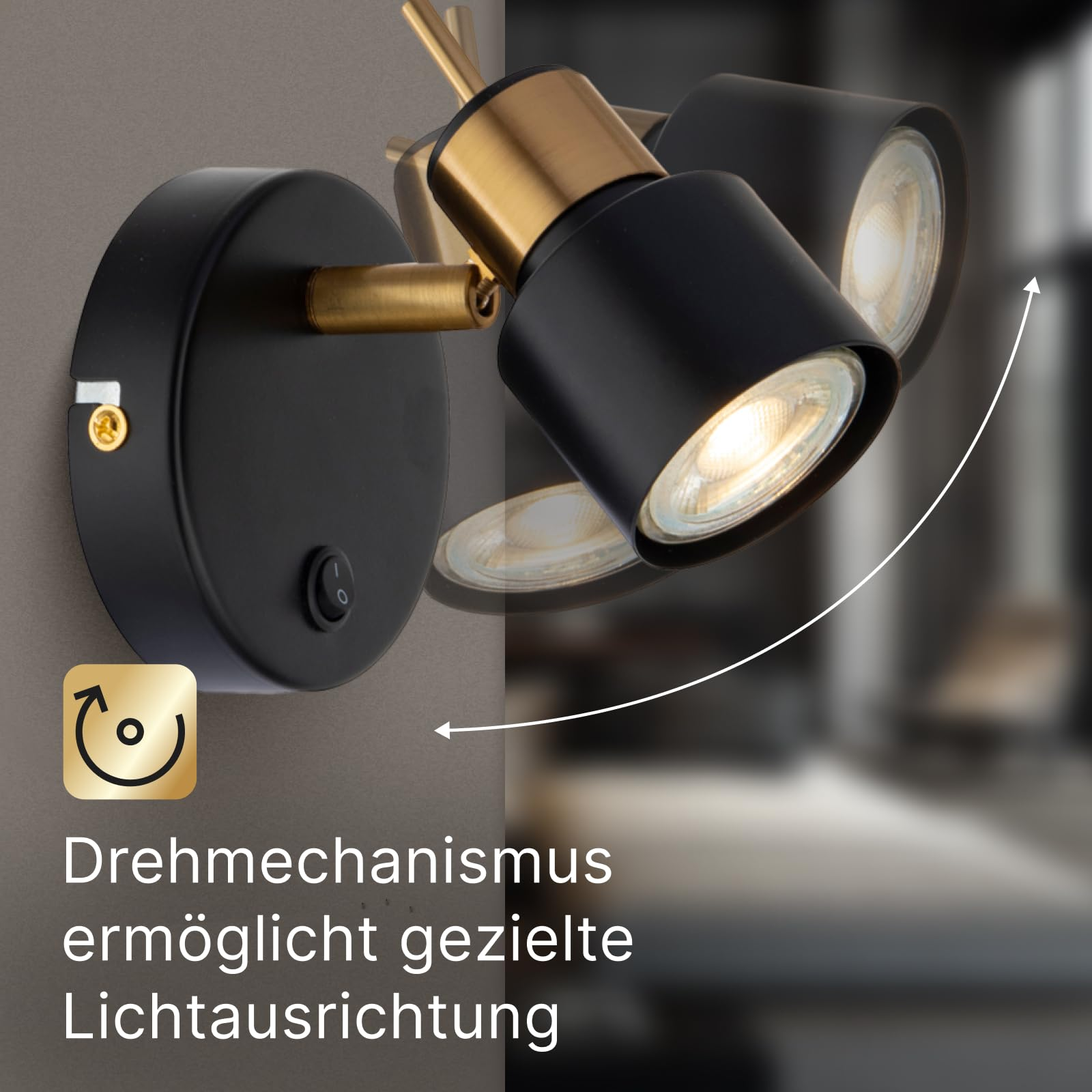 Schwarzer Wandstrahler mit gold. Akzenten, schwenkbaren Leuchtenköpfen.