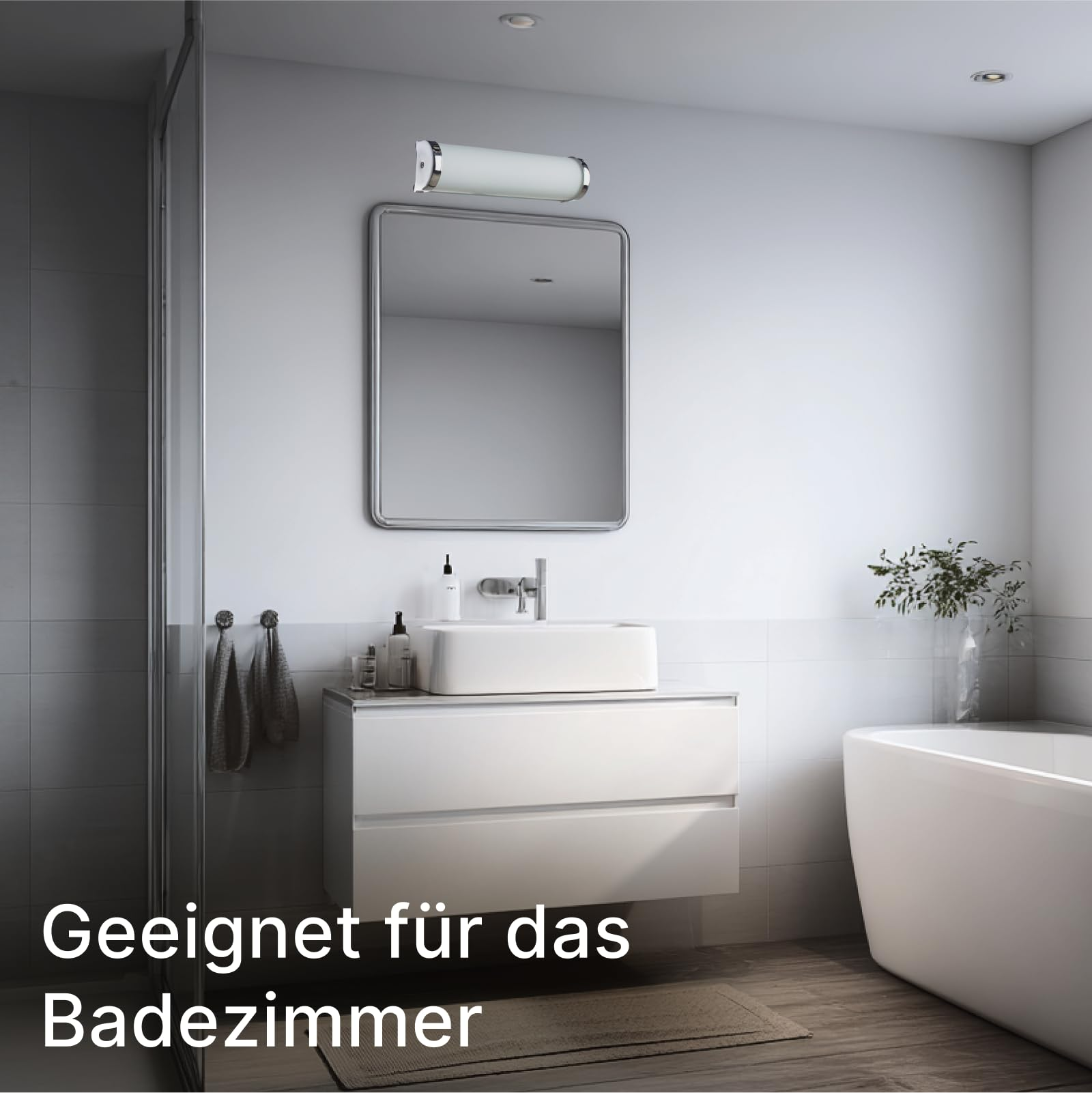 Modernes Badezimmer mit Waschbecken, Spiegel, Badewanne und Dusche.