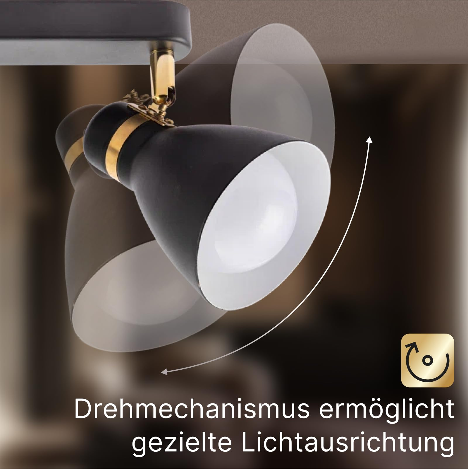 Schwarzer Lampenstrahler mit Messingakzenten, schwenkbar. Ein Symbol zeigt Drehbewegung.