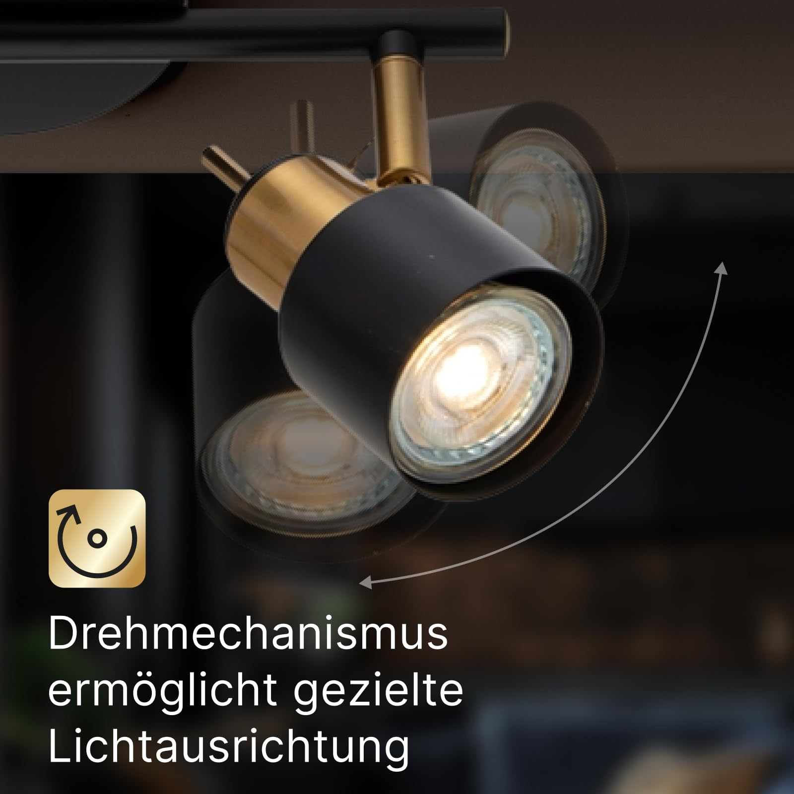 Ein moderner schwarzer und goldener Strahler mit drehbarem Mechanismus.
