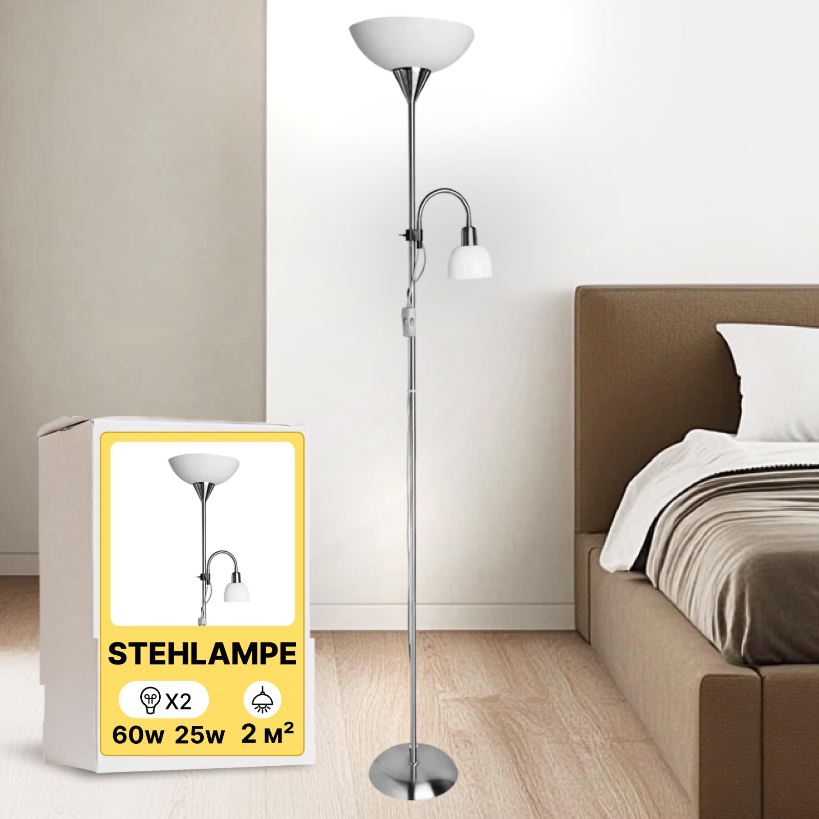 Ein silberner Stehlampe mit zwei Lichtern steht neben einem Bett.