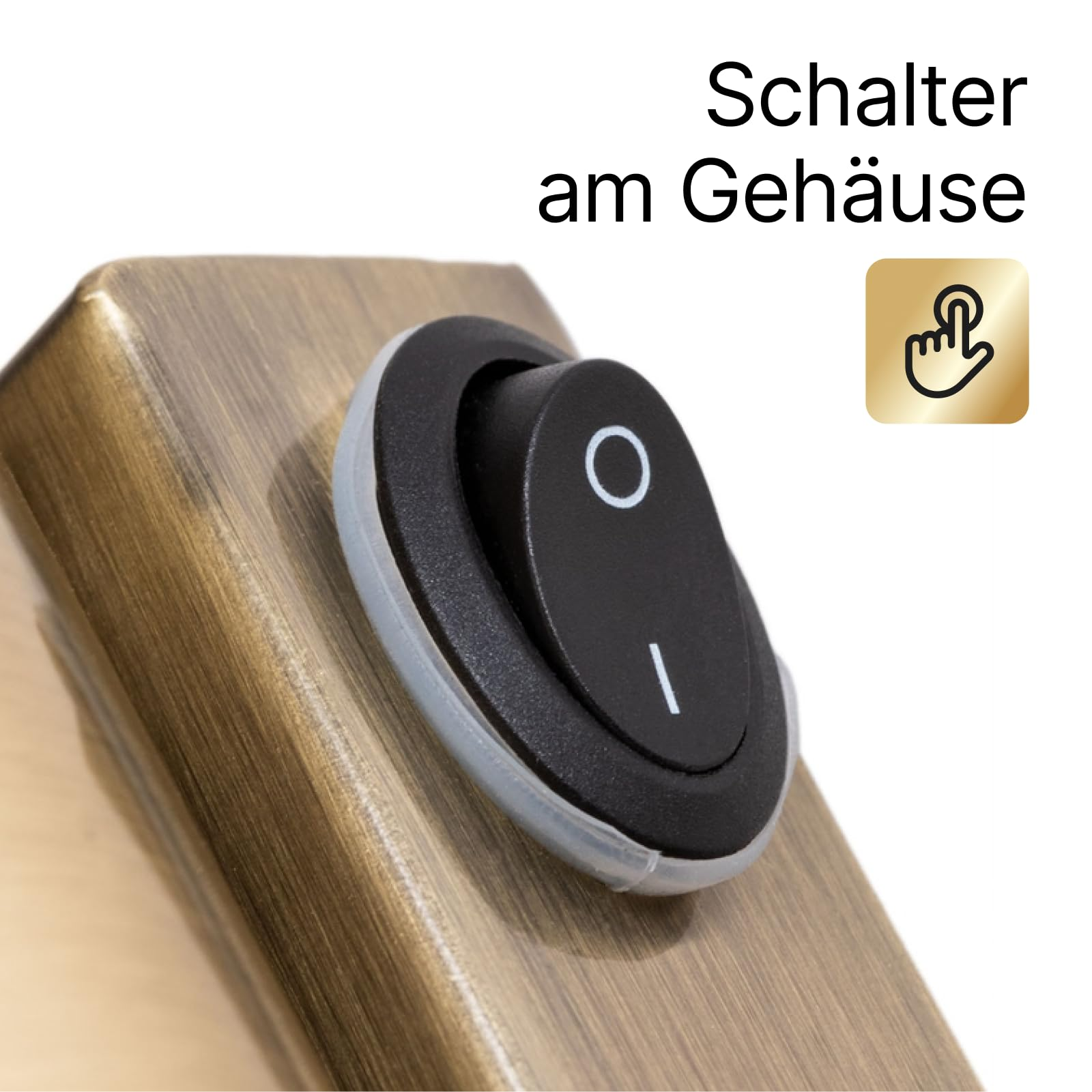 Ein schwarzer Kippschalter mit einem Kreis und Strich auf einem metallisch bronzefarbenen Gehäuse.