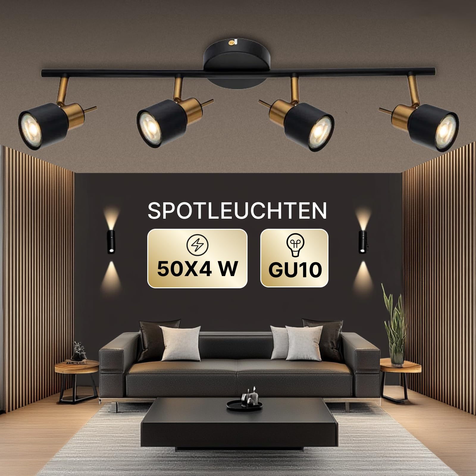 Ein moderner Wohnraum mit einem schwarzen Sofa, Couchtisch und einem Deckenstrahler mit vier Lichtern.