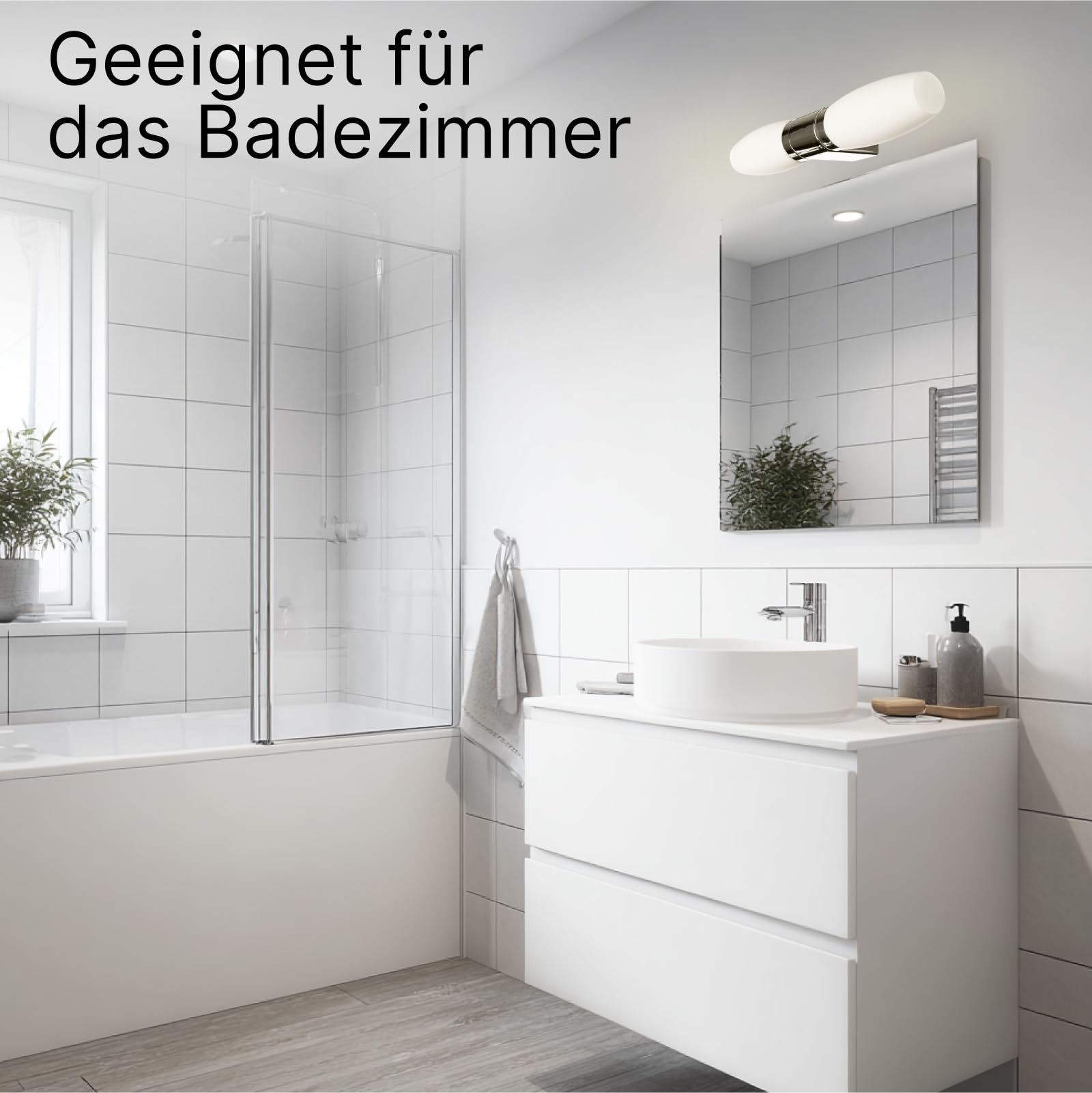 Modernes Badezimmer mit Badewanne, Dusche und Waschbecken.