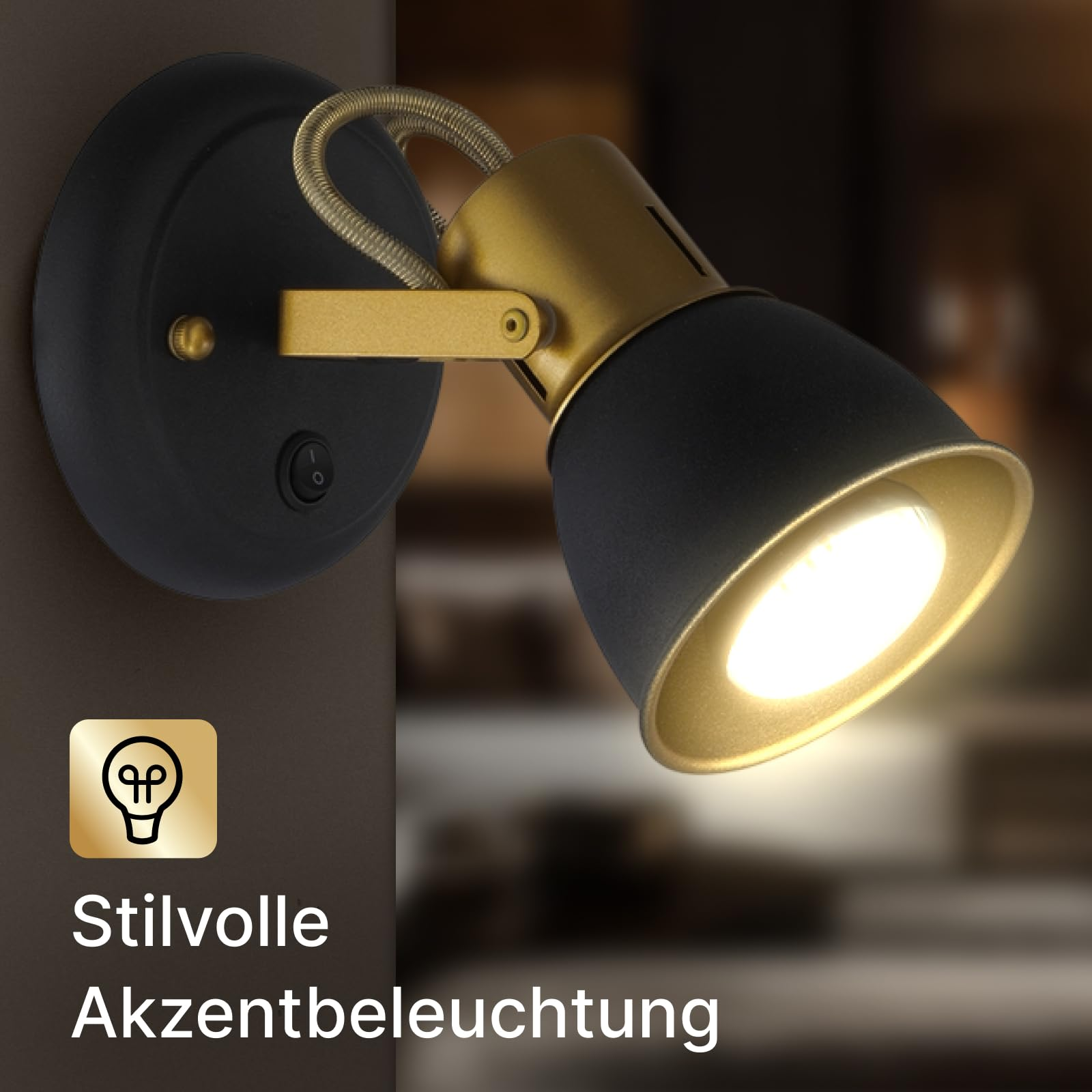 Ein schwarzer und goldener Wandstrahler mit Ein-/Ausschalter ist beleuchtet.