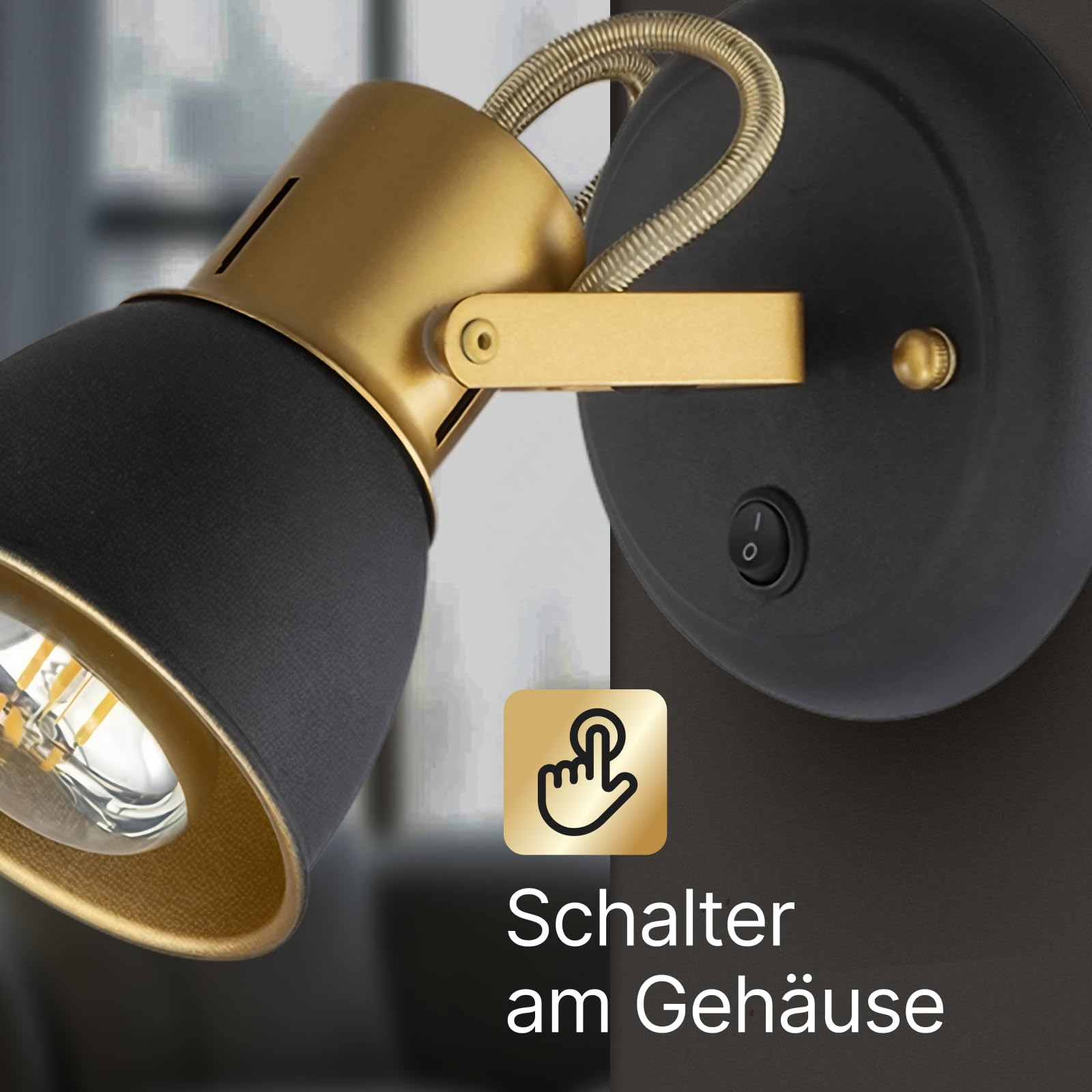 Schwarzer Lampenschirm mit goldener Halterung und Schalter am Gehäuse.