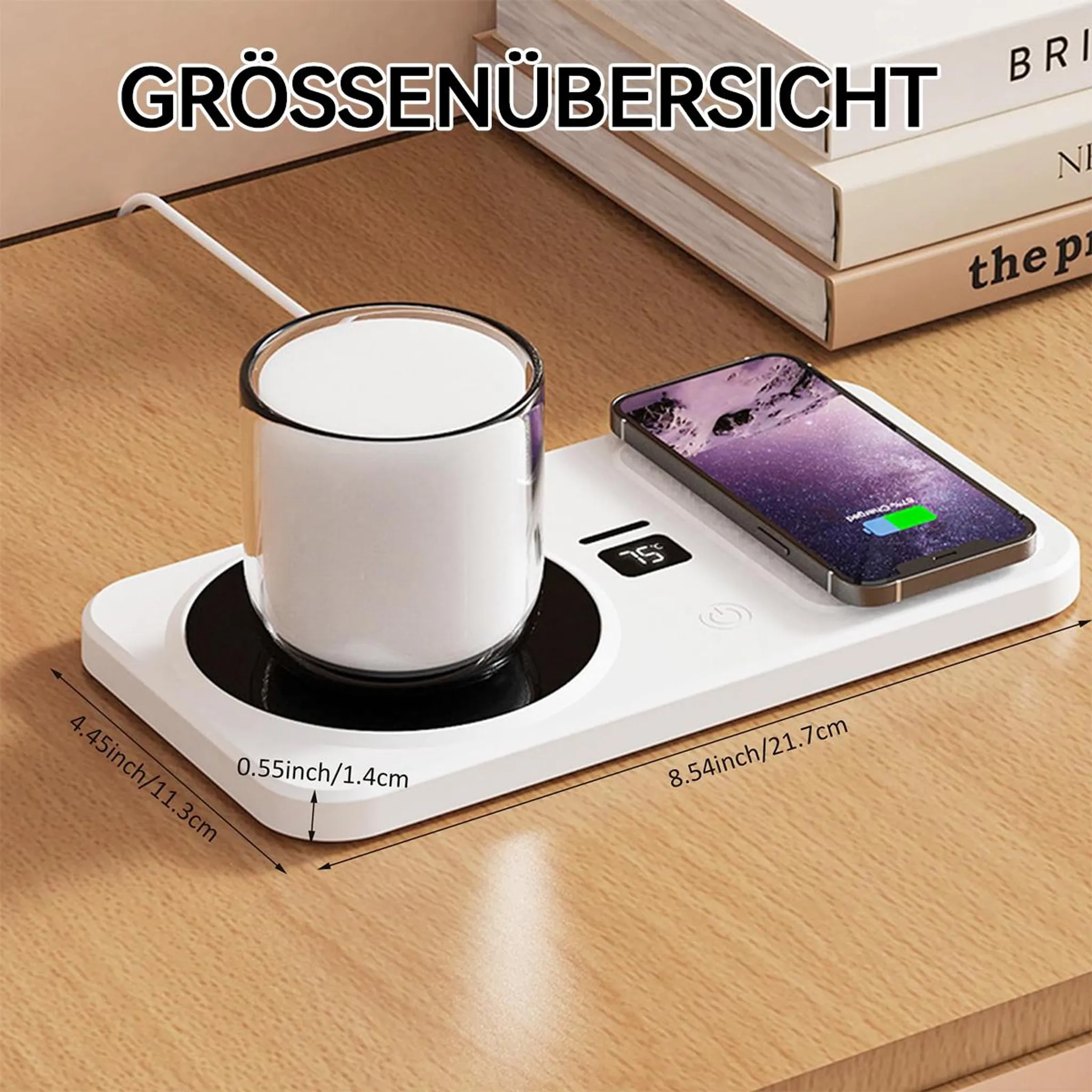 Ein weißer Becher mit weißer Flüssigkeit auf einer weißen Heizplatte neben einem Smartphone.
