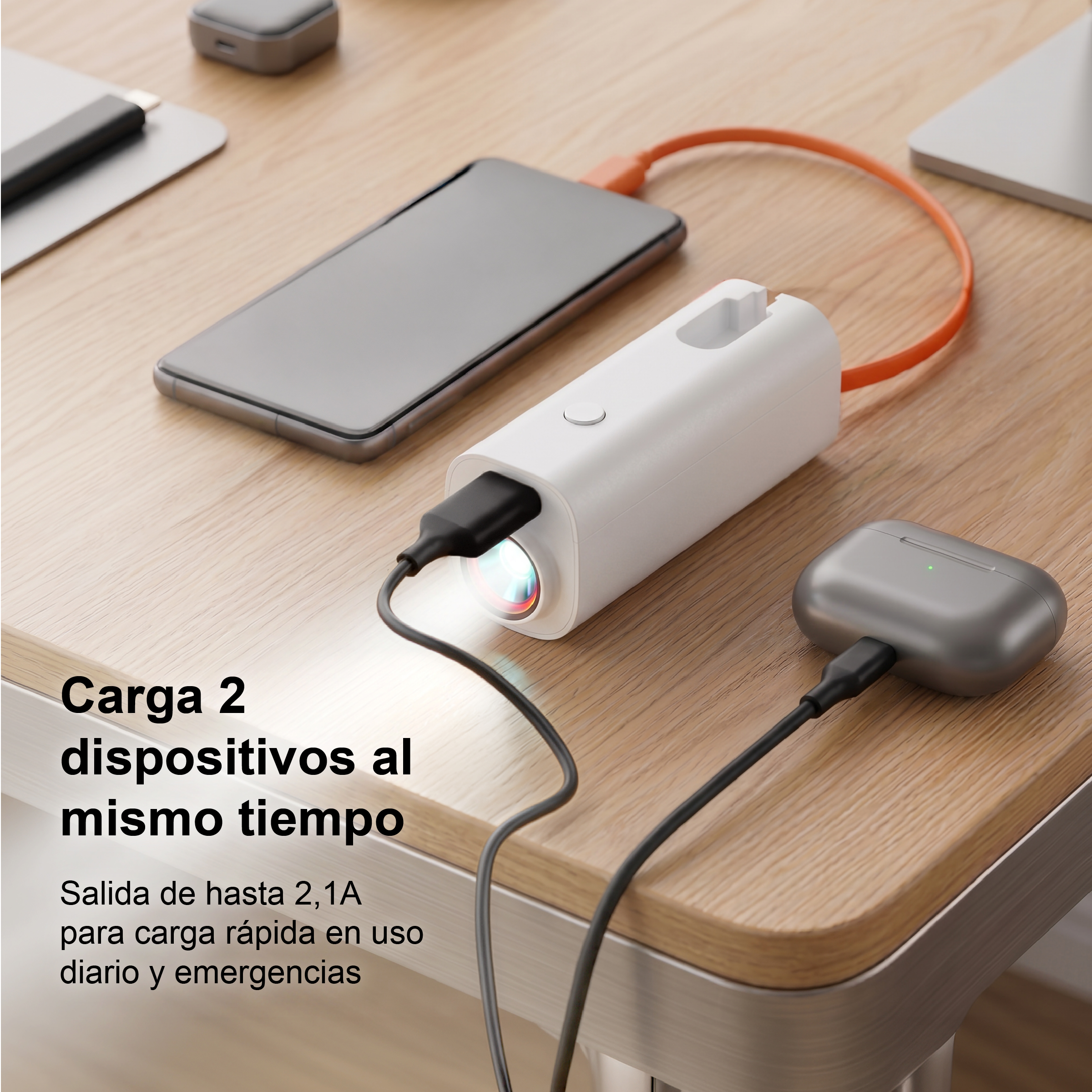 Una batería externa blanca carga un smartphone y un estuche gris.