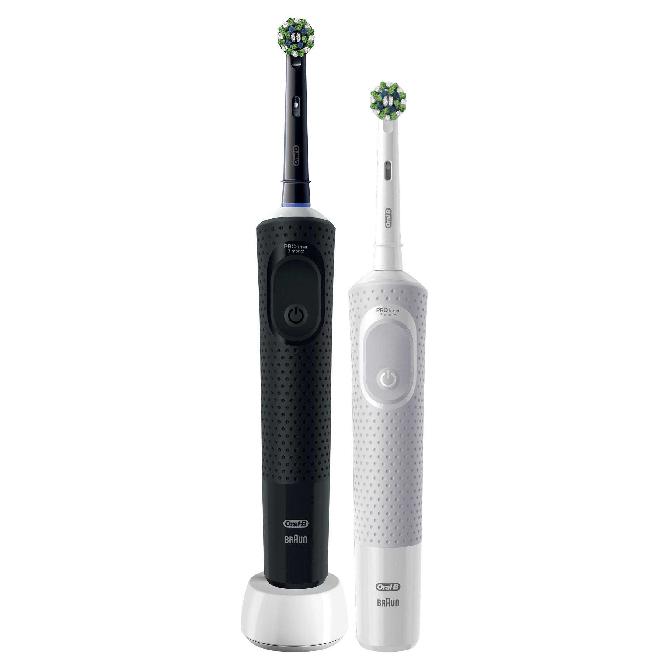 Due spazzolini Oral-B, nero e bianco, su un supporto bianco.