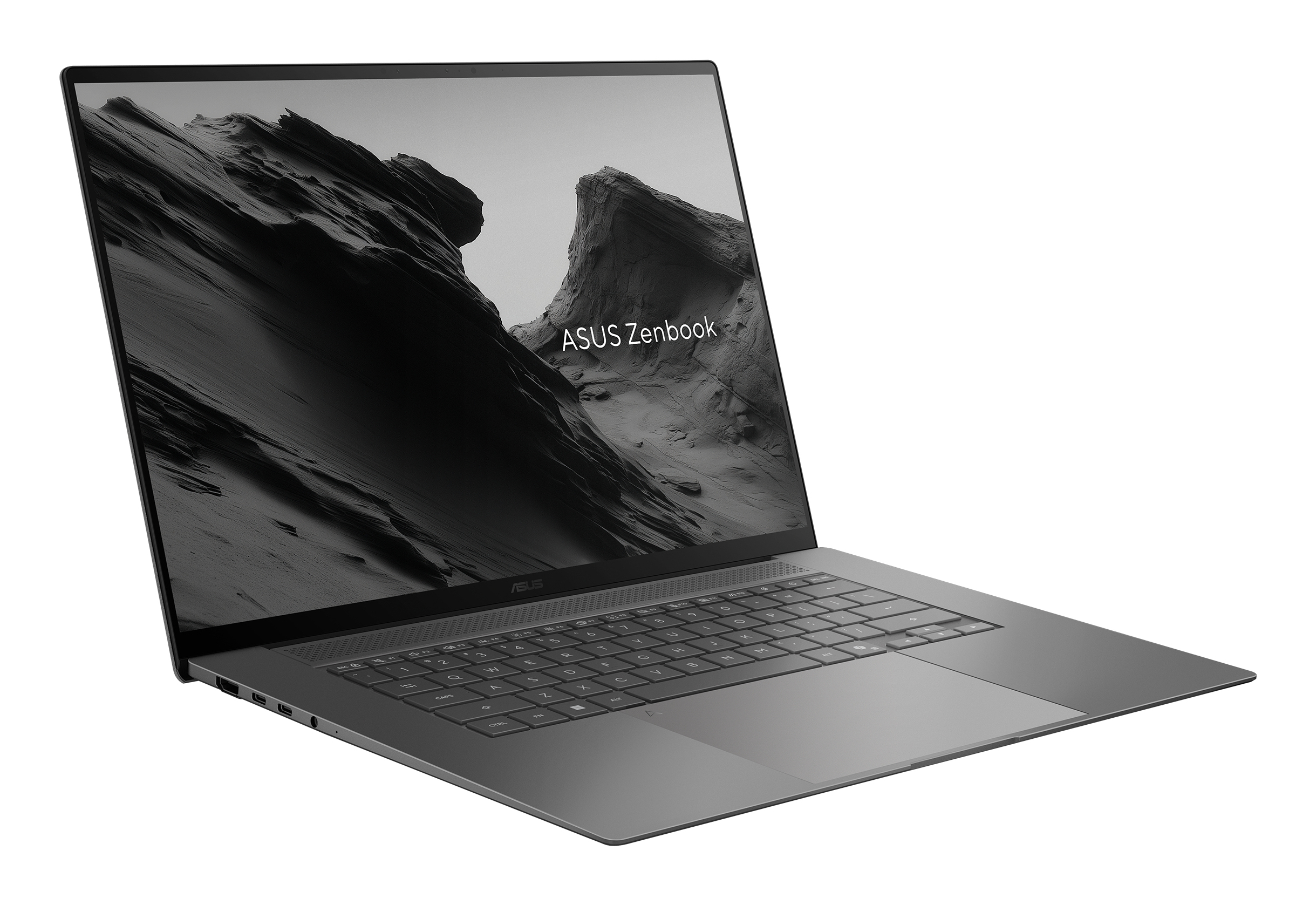 Un laptop Asus Zenbook grigio che mostra un paesaggio montano sullo schermo.