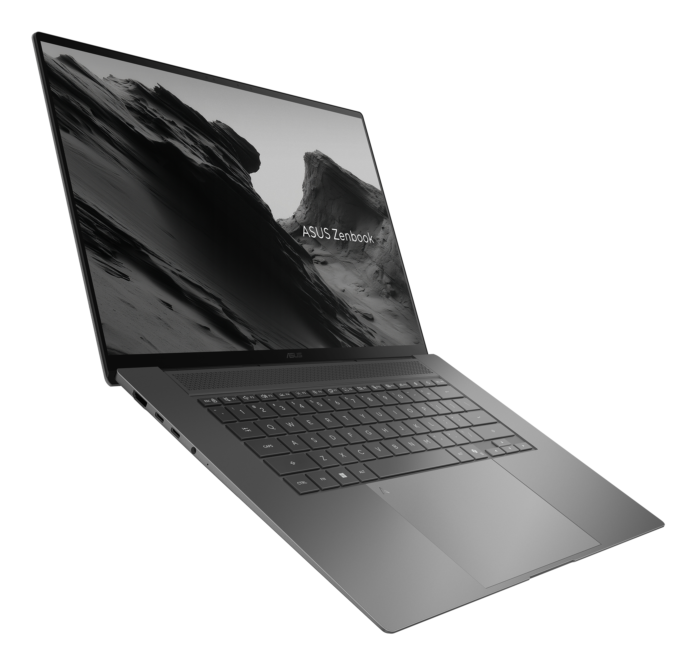 Un laptop Asus Zenbook grigio scuro con uno sfondo di paesaggio è aperto.