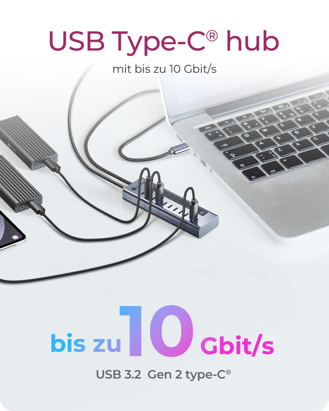 Un hub USB-C connecté à des appareils et un ordinateur portable.