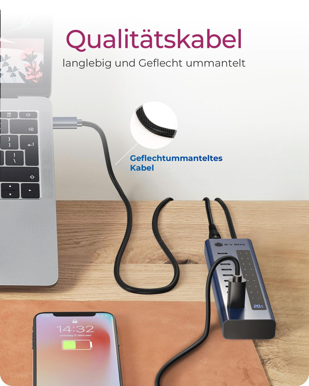 Un câble USB-C relie un ordinateur portable à un chargeur ICY BOX. Un téléphone est devant.