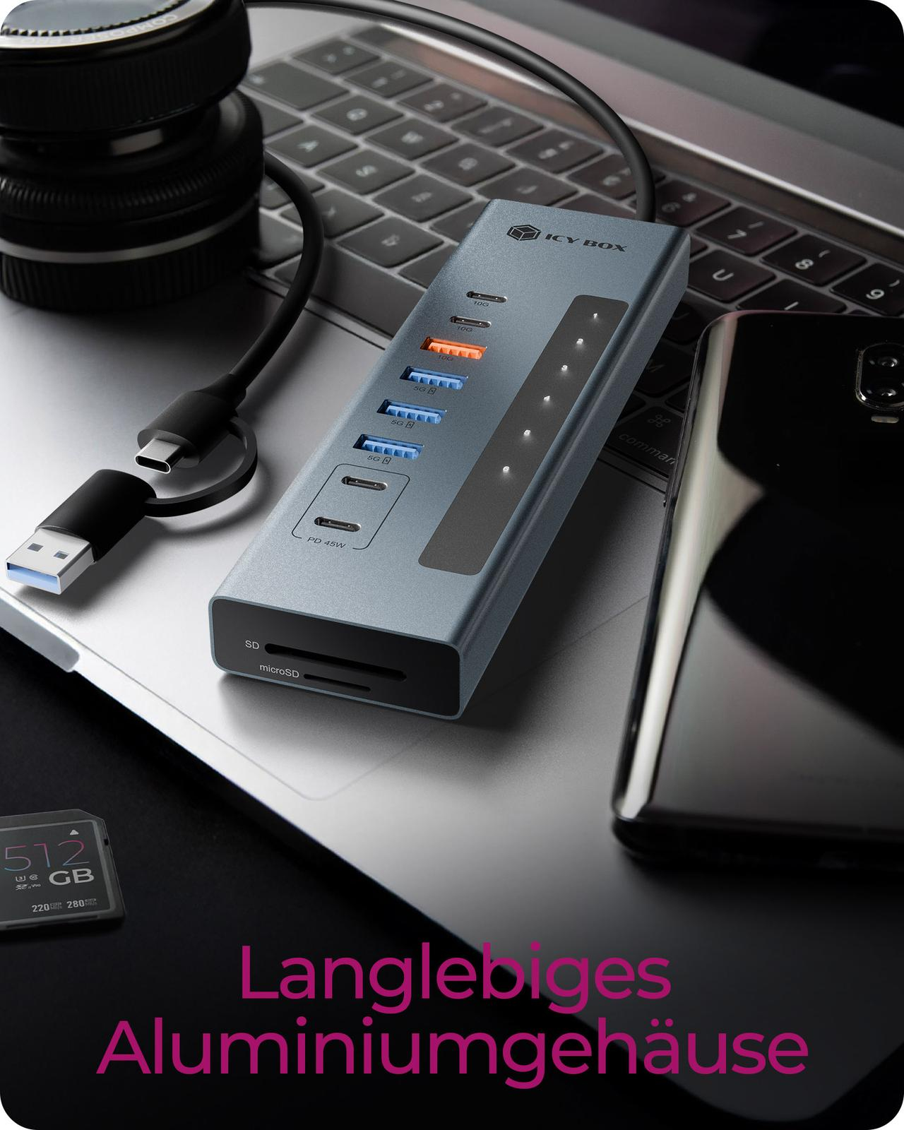 Hub USB-C gris avec ports, lecteur de carte SD, ordinateur portable, téléphone et carte mémoire.
