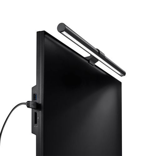 A black monitor screen with a light bar attached to the top. A USB cable is plugged in.