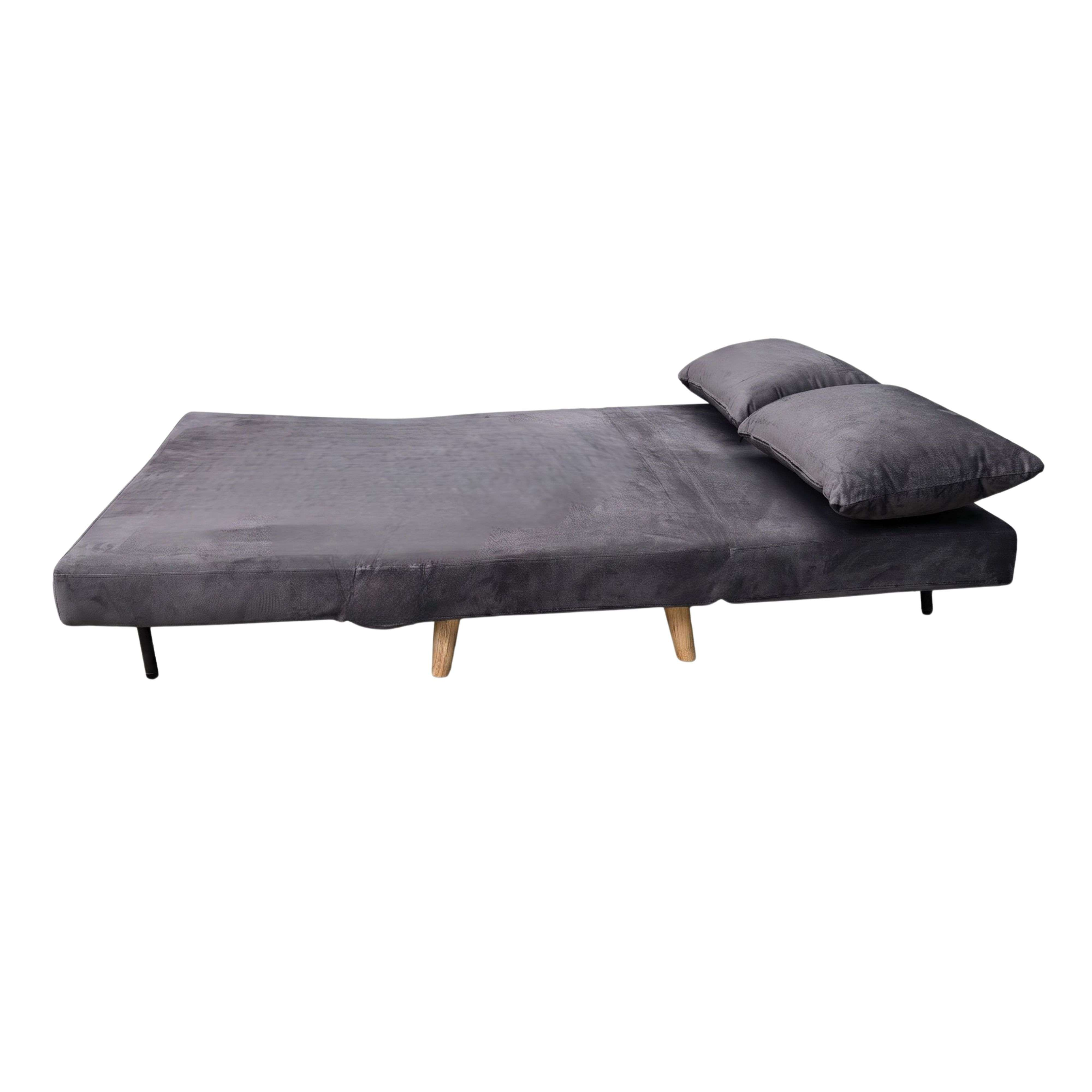 Sofá cama gris con dos cojines, patas de madera y dos patas negras.
