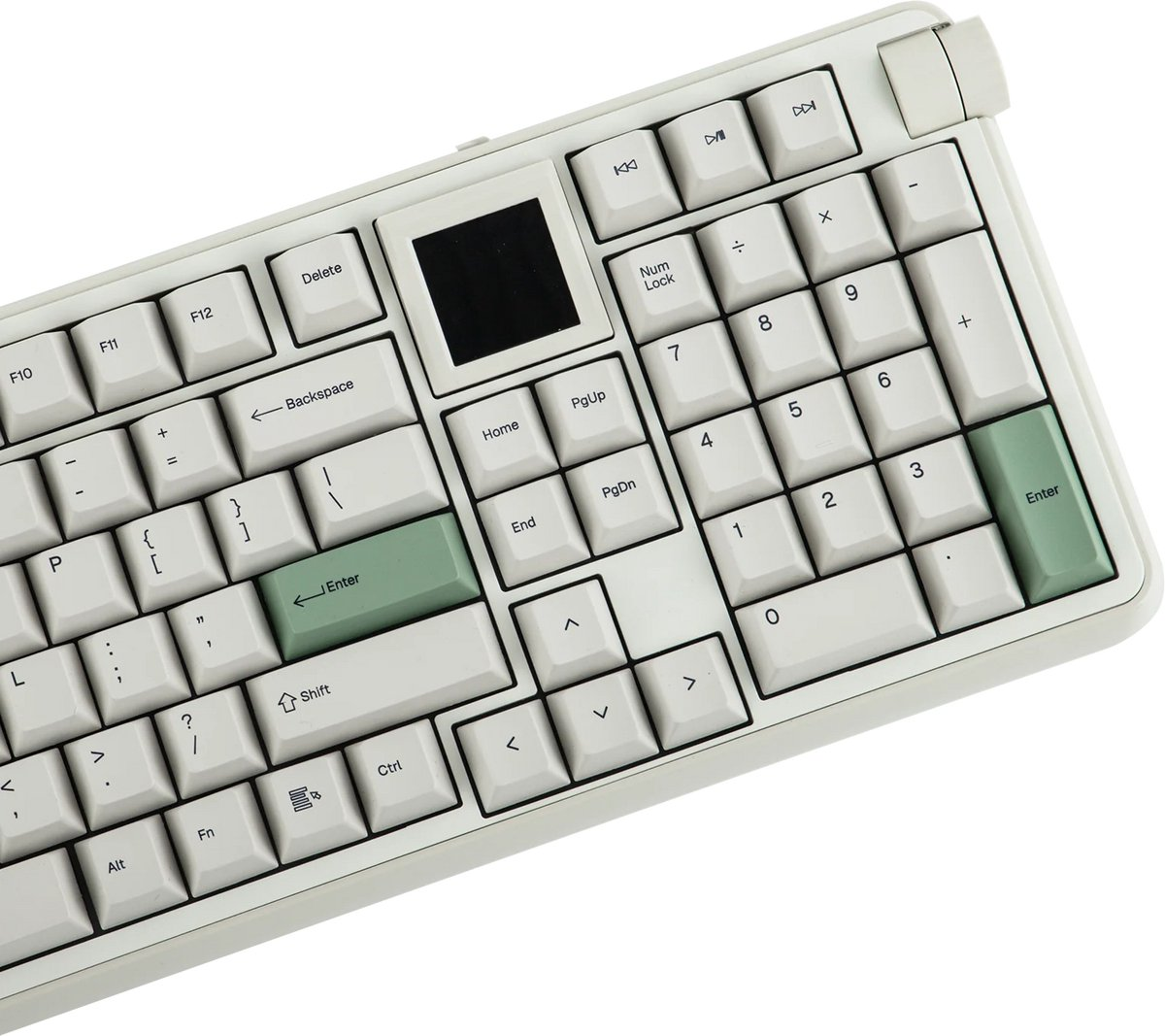 Vue en gros plan, inclinée, d'un clavier blanc avec écran noir et touches Entrée vertes.