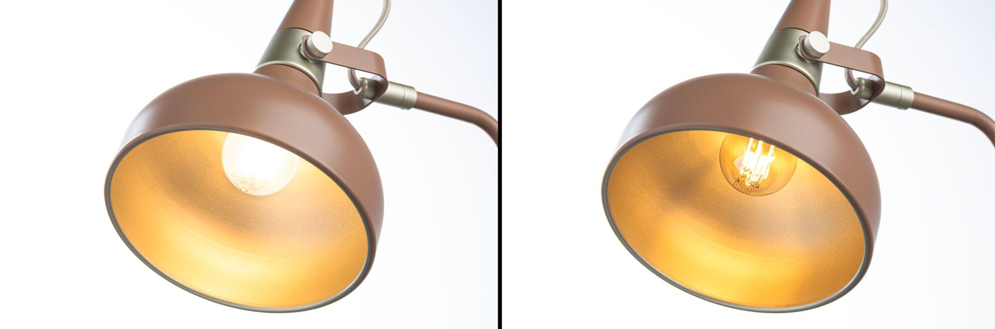 Braune Lampe mit goldenem Reflektor und Glühbirne, Nahaufnahme.