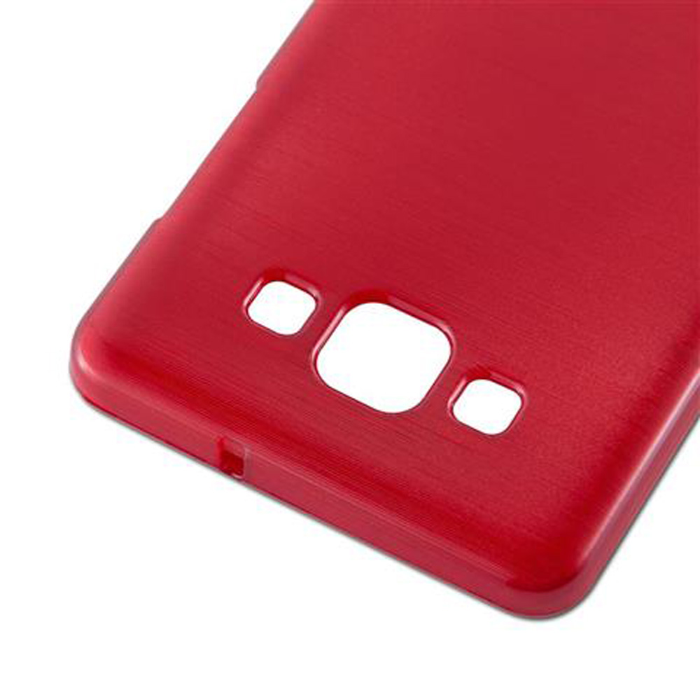 Una funda de teléfono roja con recortes para cámara y flash.