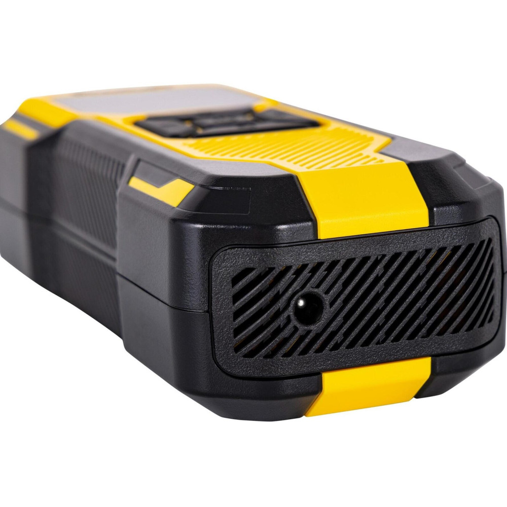 Un dispositivo nero e giallo con prese d'aria e un piccolo oggetto rotondo.