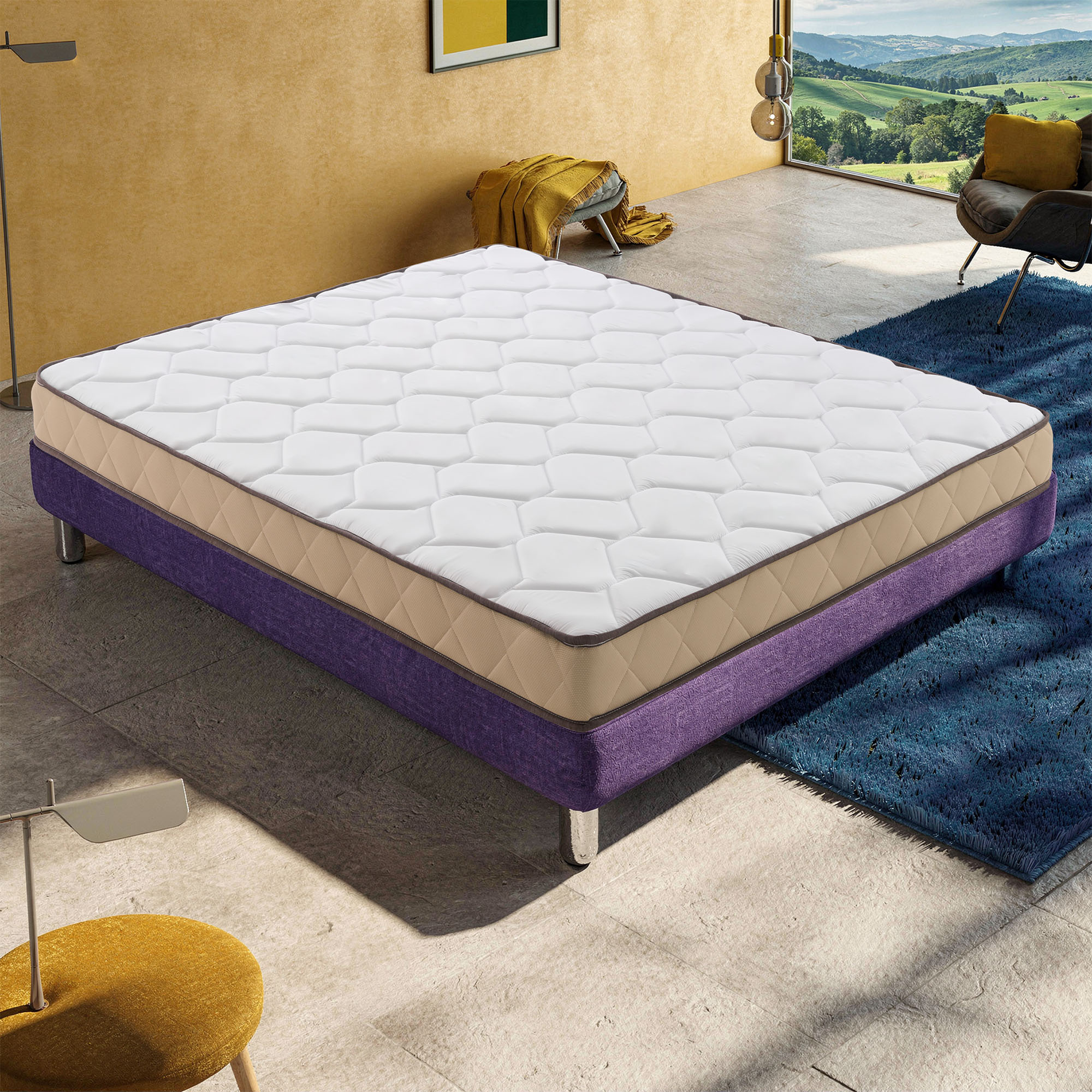 Un sobrecolchón blanco con patrón acolchado sobre un marco de cama morado.