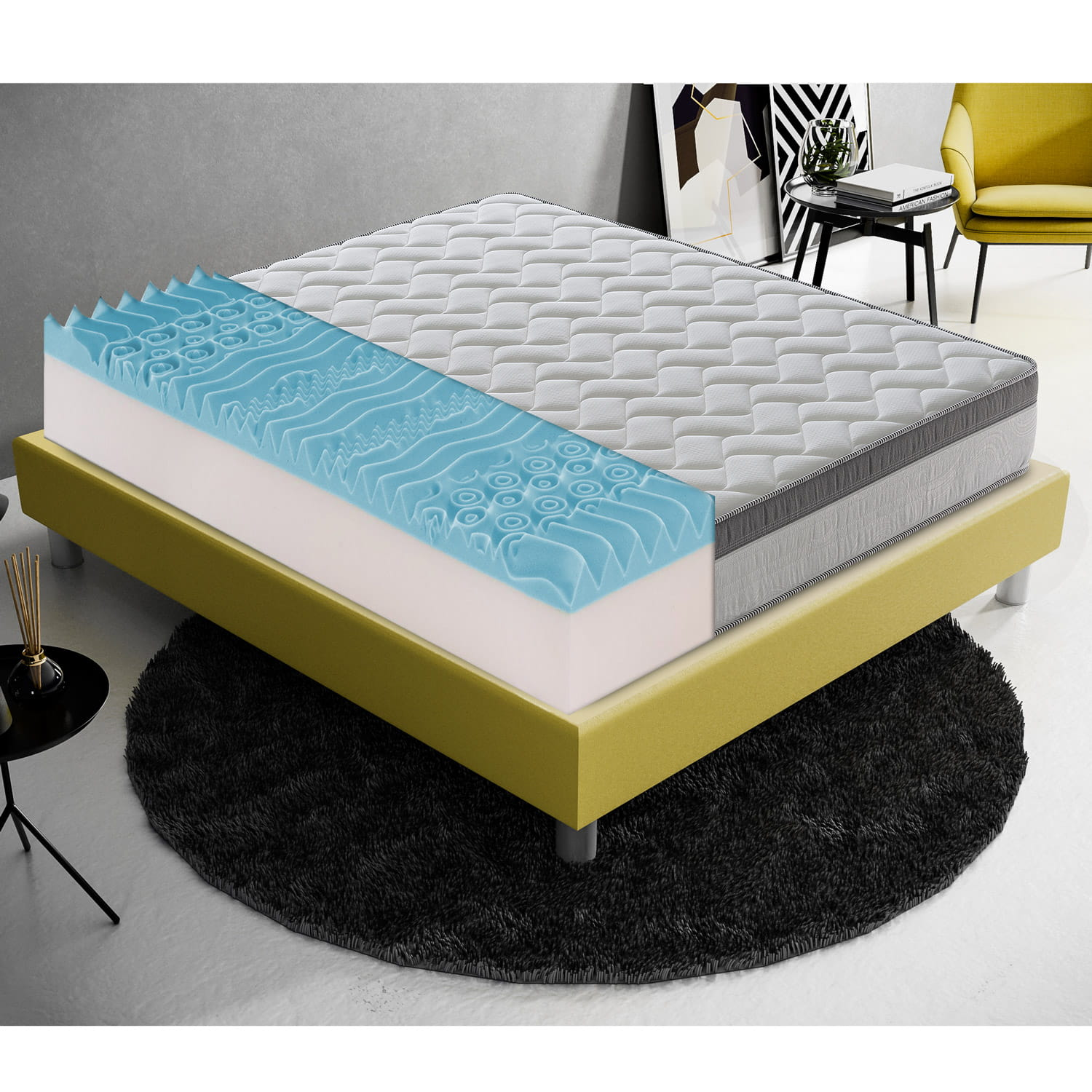 Cama con colchón y capa de espuma abierta. Base de cama amarilla, alfombra negra.