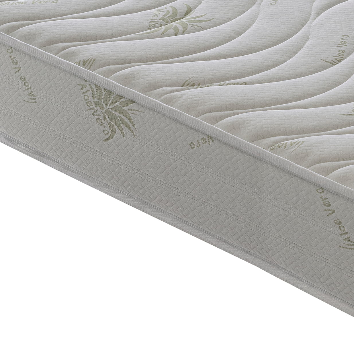 Primer plano de un colchón blanco con estampado Aloe Vera y ondas acolchadas.