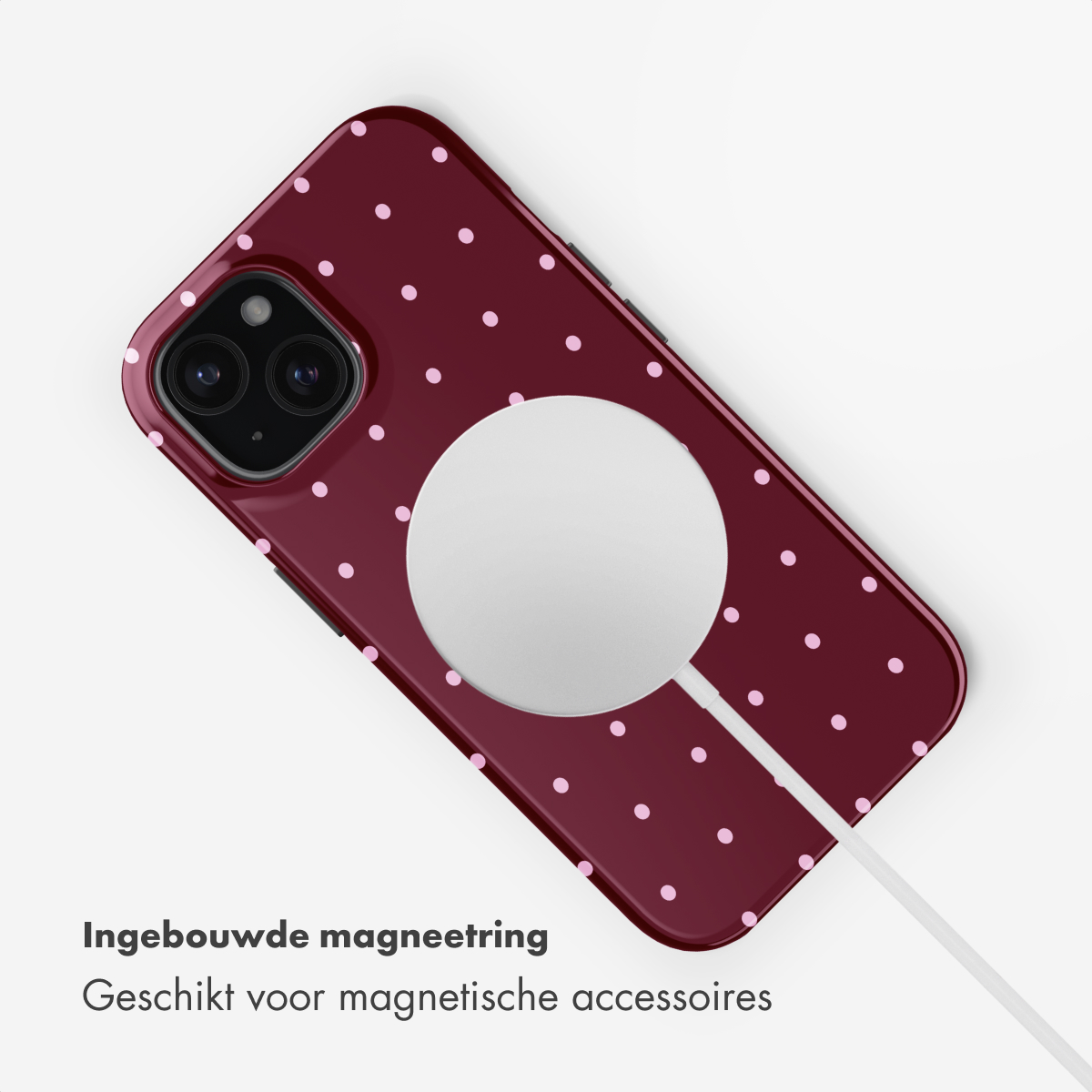 Bordeaux telefoonhoesje met roze stippen en magnetische lader.
