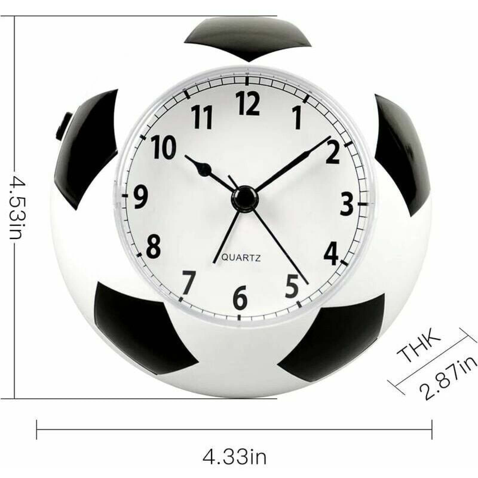 Ein Wecker in Form eines Fußballs mit schwarzen und weißen Feldern.