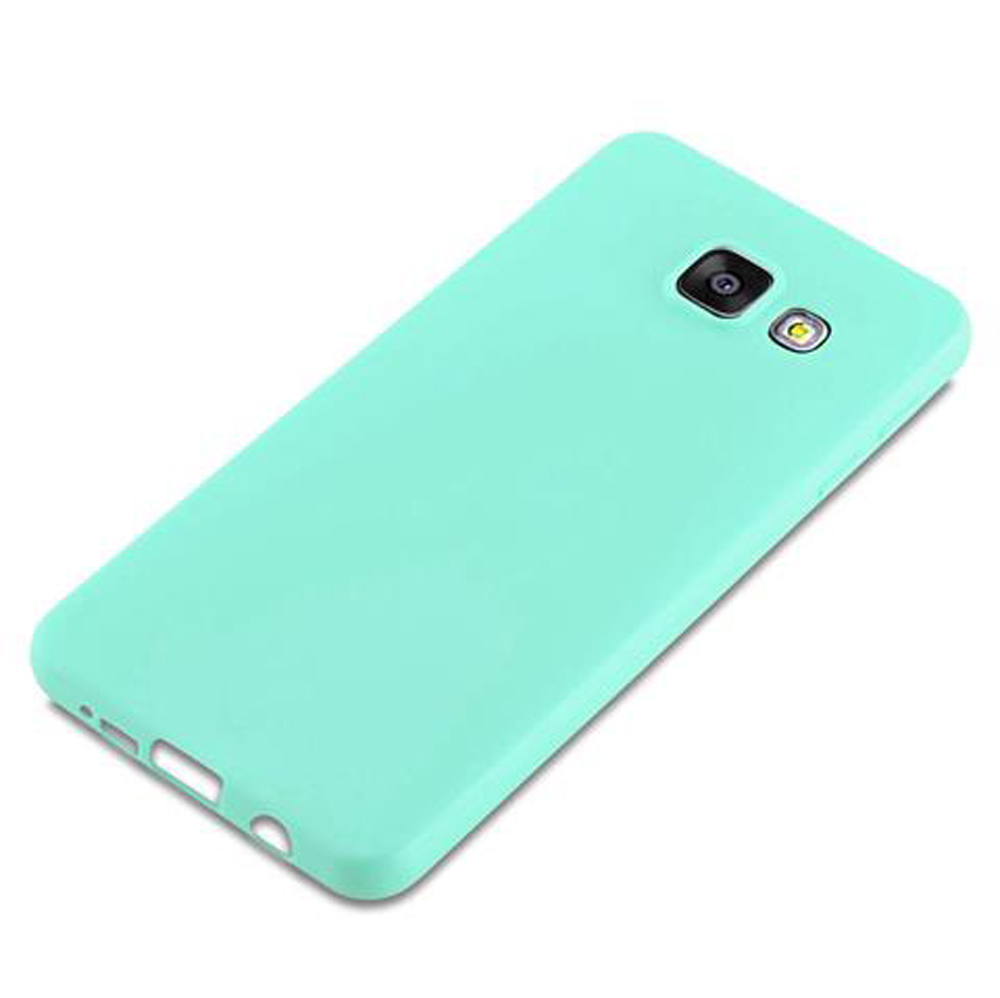 Una custodia per smartphone verde acqua chiaro vista da dietro, con obiettivo e flash.