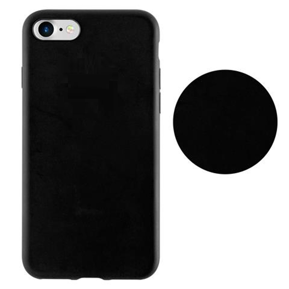 Telefono nero con fotocamera e un disco circolare nero accanto.