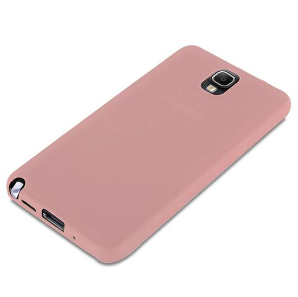 Una funda de teléfono rosa empolvado con recorte de cámara y puerto de carga.