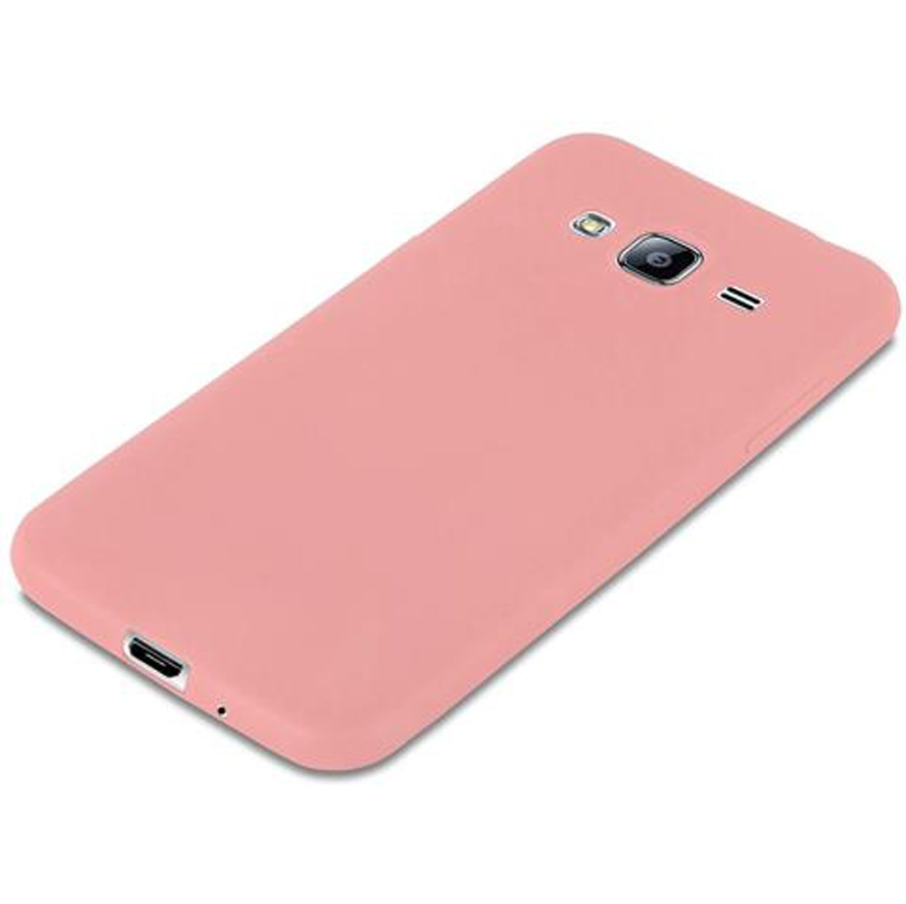 Un telefono rosa con fotocamera e porta di ricarica su sfondo bianco.