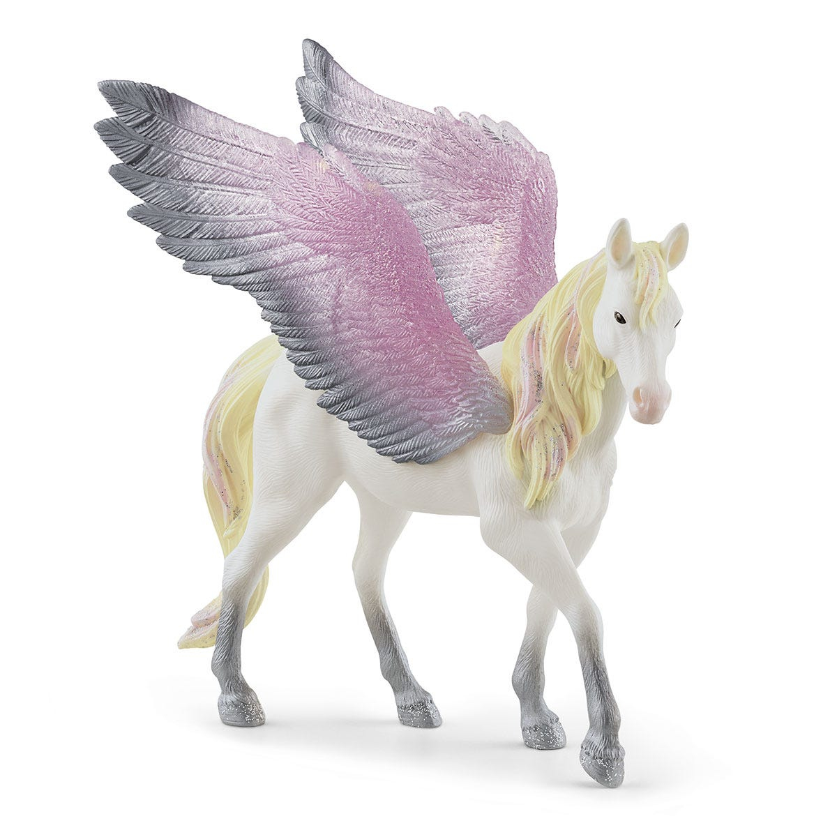 Un giocattolo bianco di Pegaso con ali rosa e grigie e una criniera gialla.